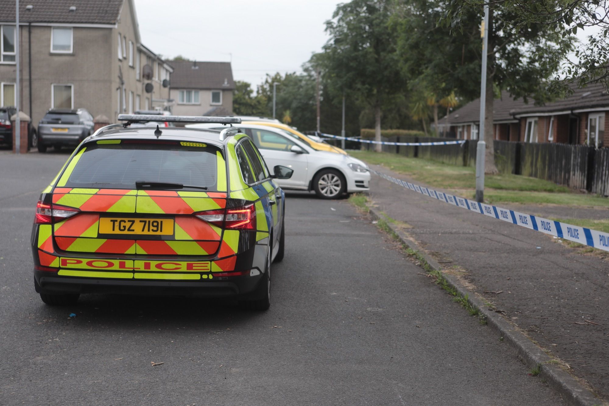 MURDER PROBE: Police cordoned off the scene of Thursday\'s murder in Twinbrook