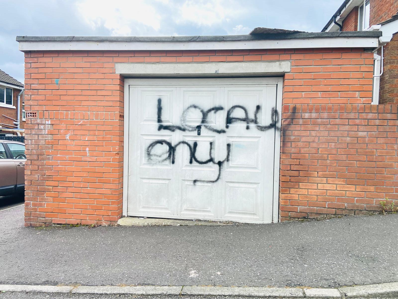 INTIMIDATION: The racist graffiti daubed on homes in NORTH Belfast