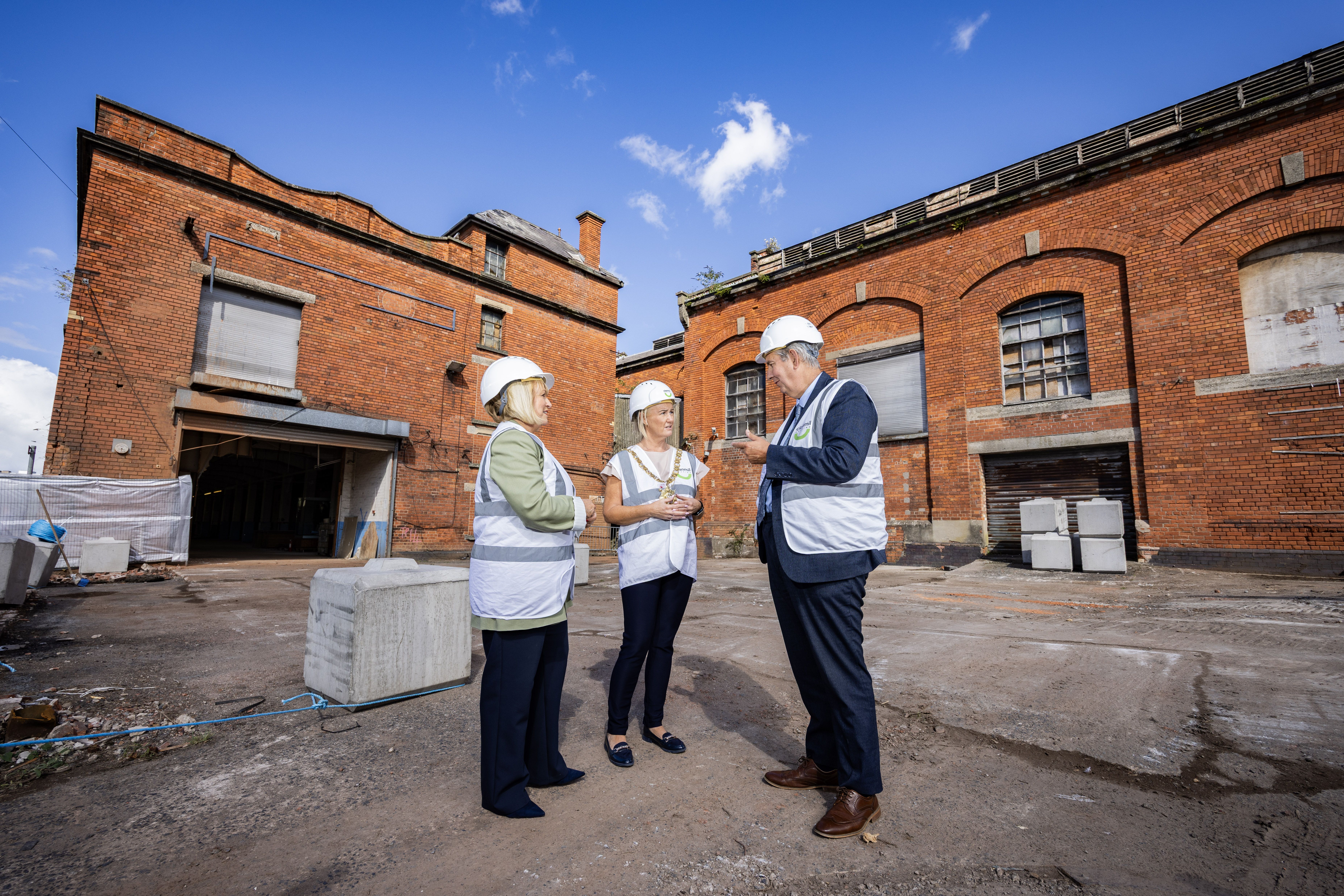 GOOD NEWS: Lord Mayor of Belfast Councillor Tracy Kelly and Edwin Poots MLA joined Carol McTaggart, CEO of Clanmil Housing, on the site of the new homes at Rydalmere Street