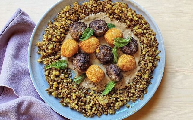 PLATING UP: Spiced beef with potato bonbons with curried giant couscous