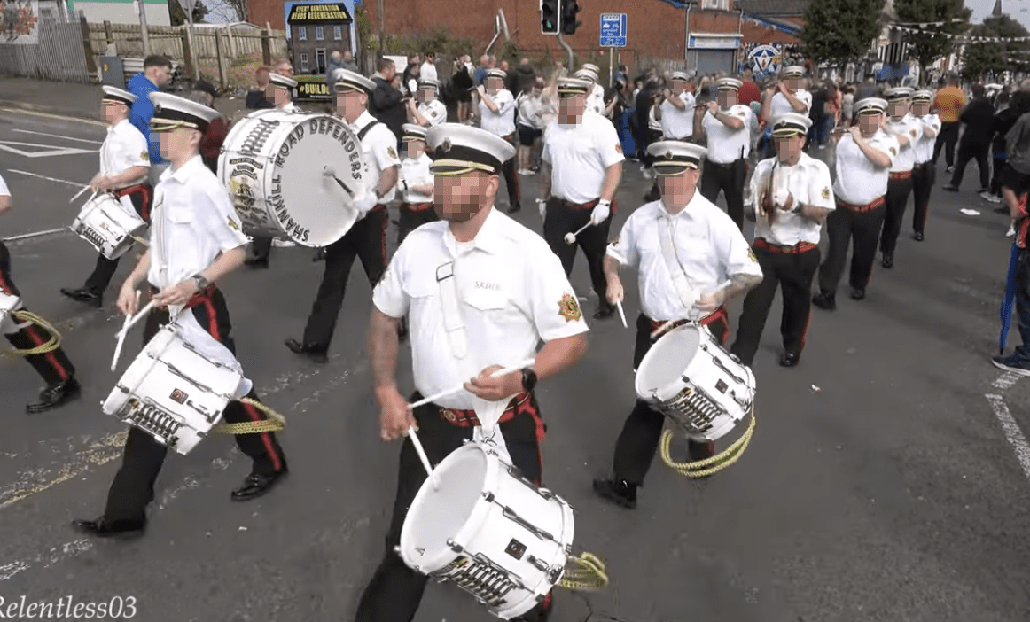 ON THE MARCH: Shankill Defenders at Saturday\'s Brian Robinson parade – they\'re one of three bands to breach a commitment not to take part in UVF memorials