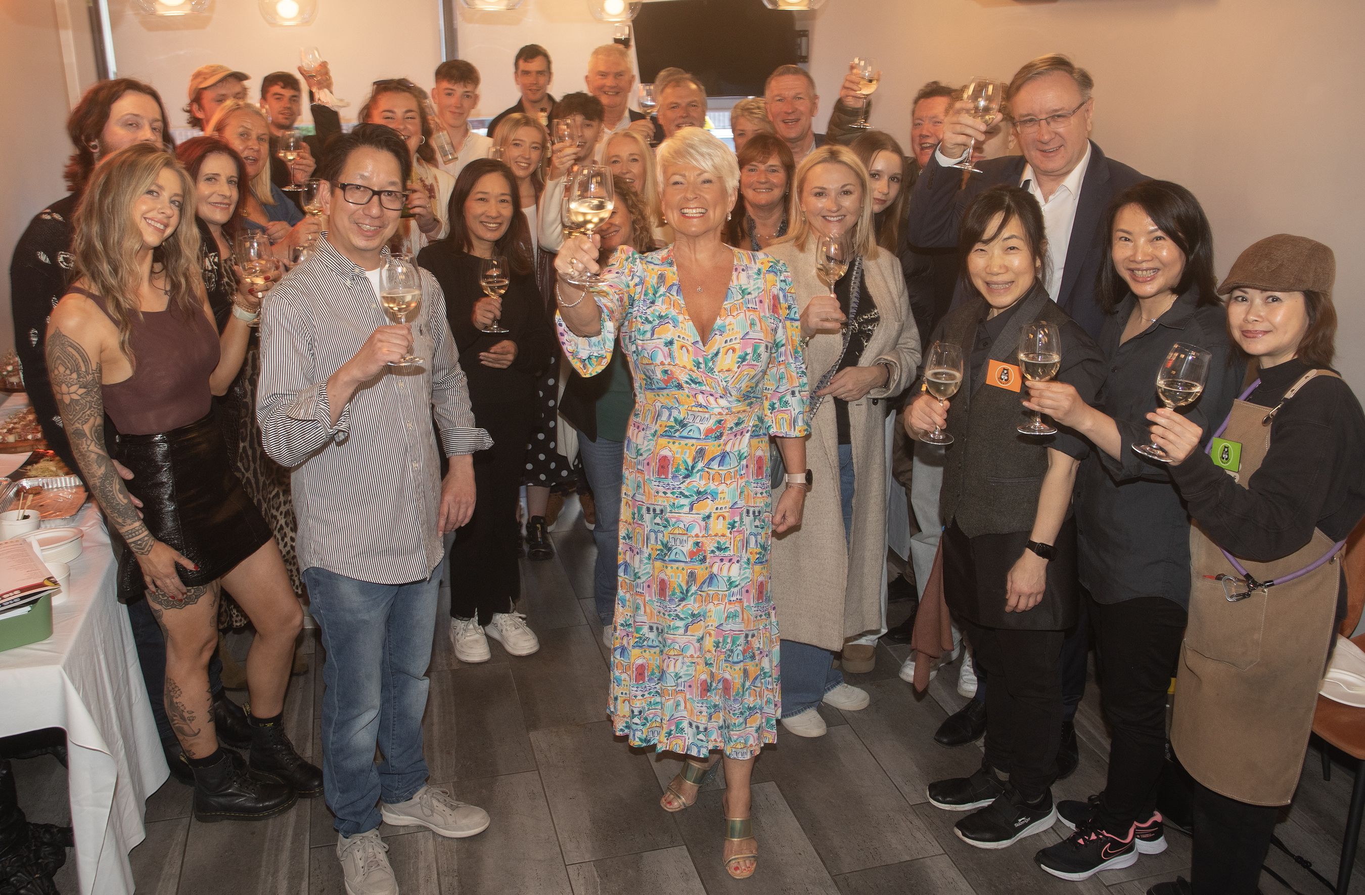 OFFICIAL OPENING: Colin Wong and Pamela Ballantine with staff and guests at 316 MEIN