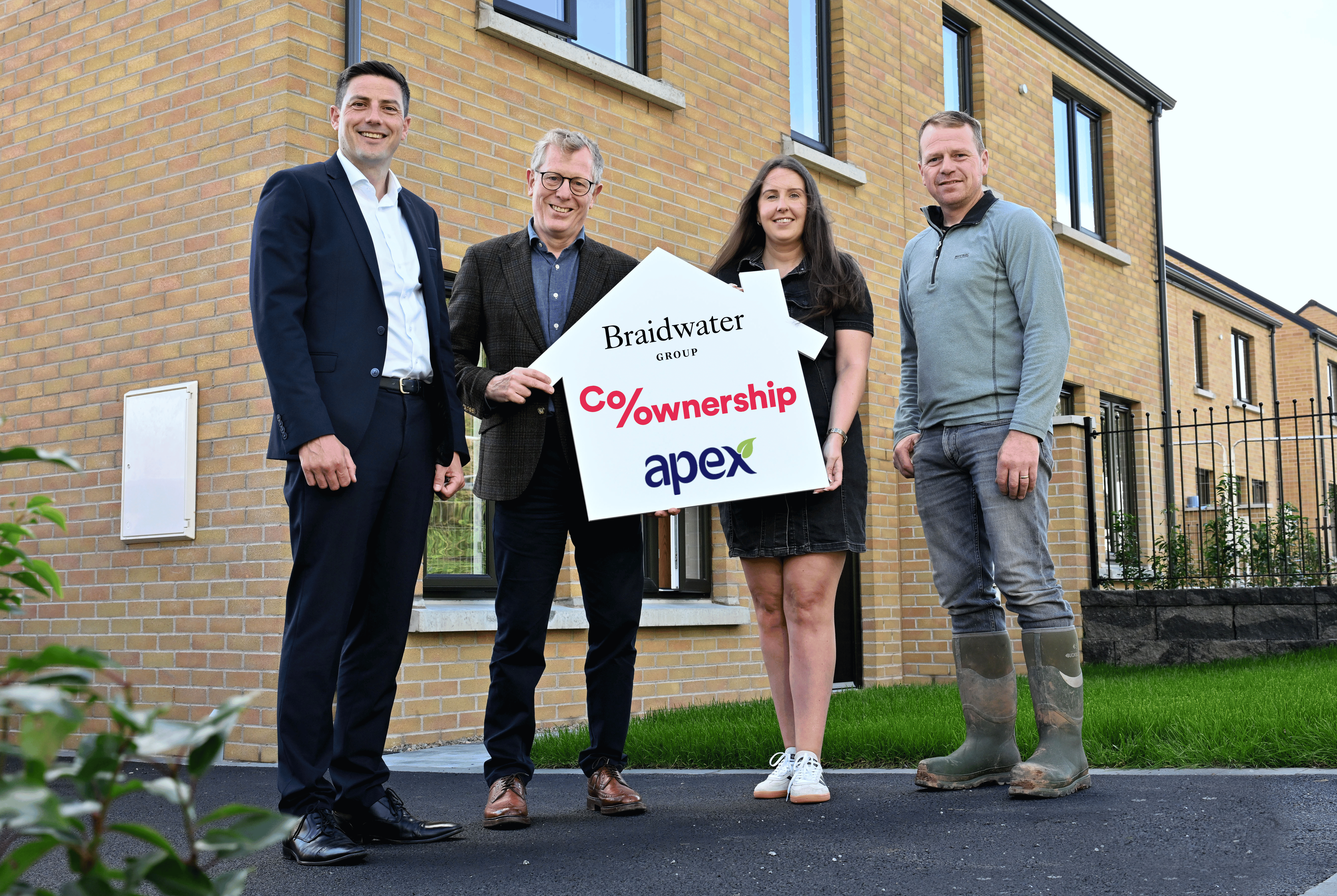 OPPORTUNITIES: Barry Kerr, Mark Graham, homeowner Lauren Perry and Colin Britton from Braidwater Group
