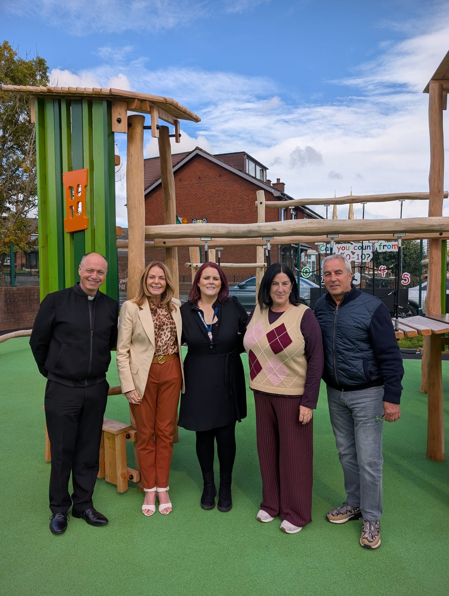 OPENING: Fr Martin Graham (St Peter\'s Cathedral), Councillor Tina Black, St Peter\'s Nursery Principal Ríoghnach Hall, Angie Mervyn (Education Programme Manager, West Belfast Partnership Board) and Pat Sheehan MLA