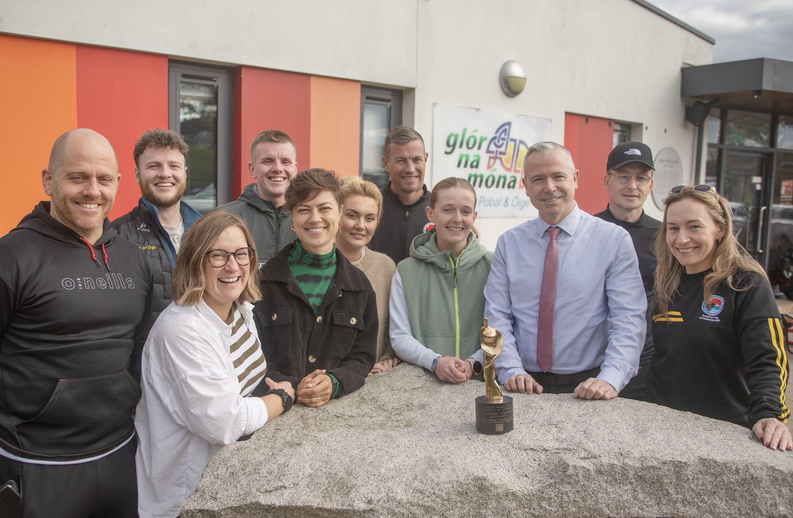 IRISH LANGUAGE AWARD: Pól Deeds from Foras Na Gaeilge with the team from Glór na Móna who won last year\'s award