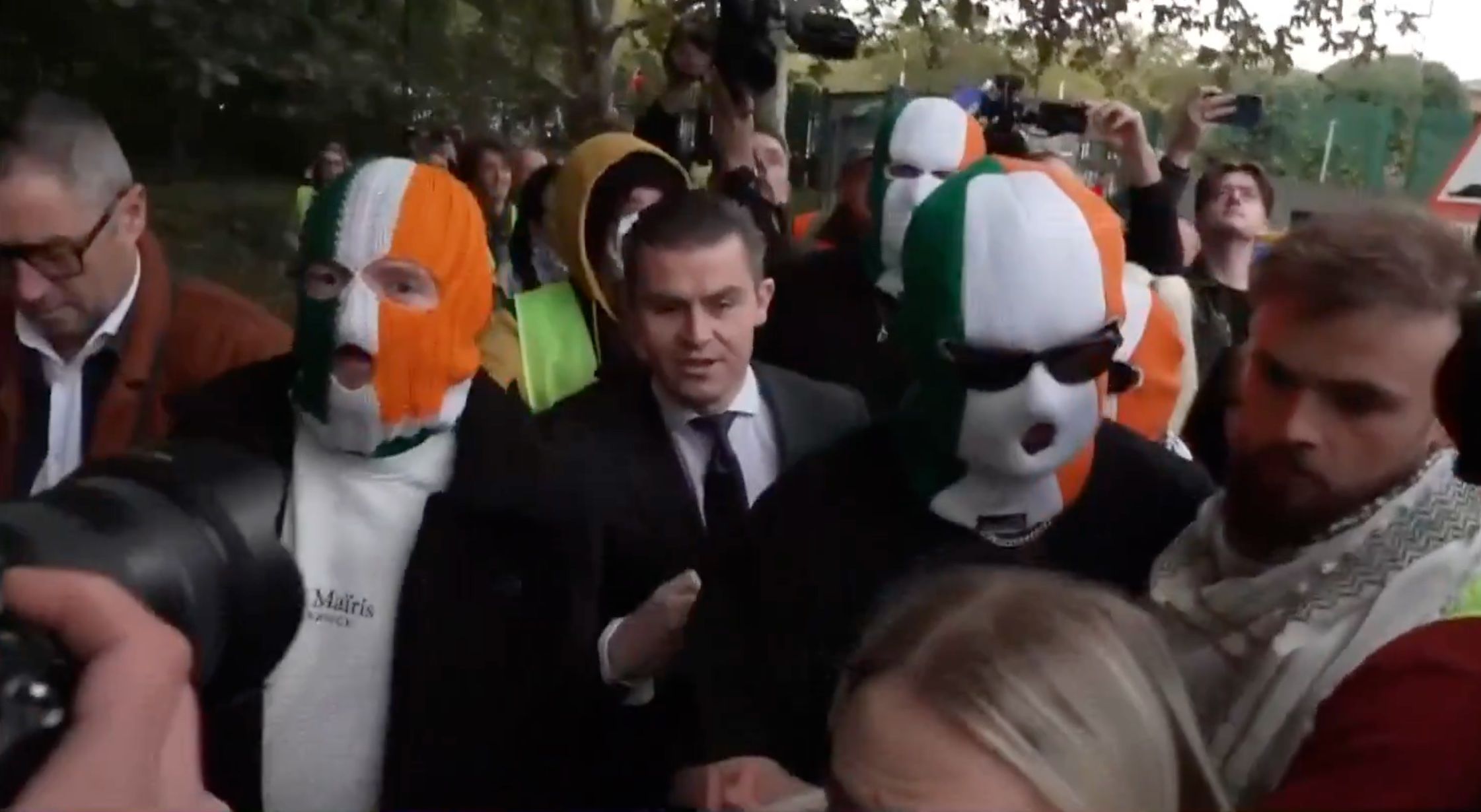 COURT: Kneecap members arrived at Woolwich Crown Court this morning with lawyer Darragh Mackin 