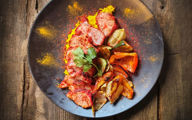 PLATING UP: Tandoori pork fillet, Biryani rice with grilled veg and tandoori curry 