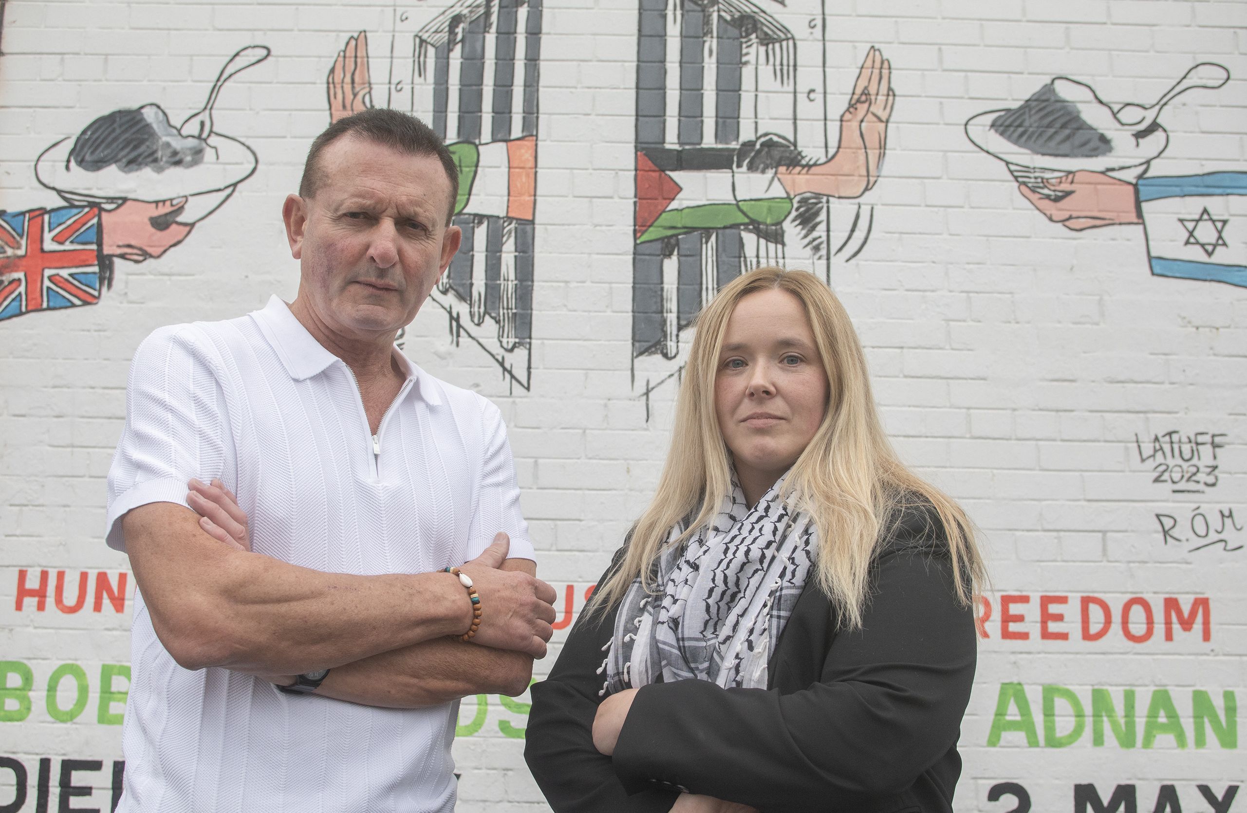 PALESTINE SUPPORT: Aisling Ní Mhachail and Seamus Kearney at the International Wall on the Falls Road
