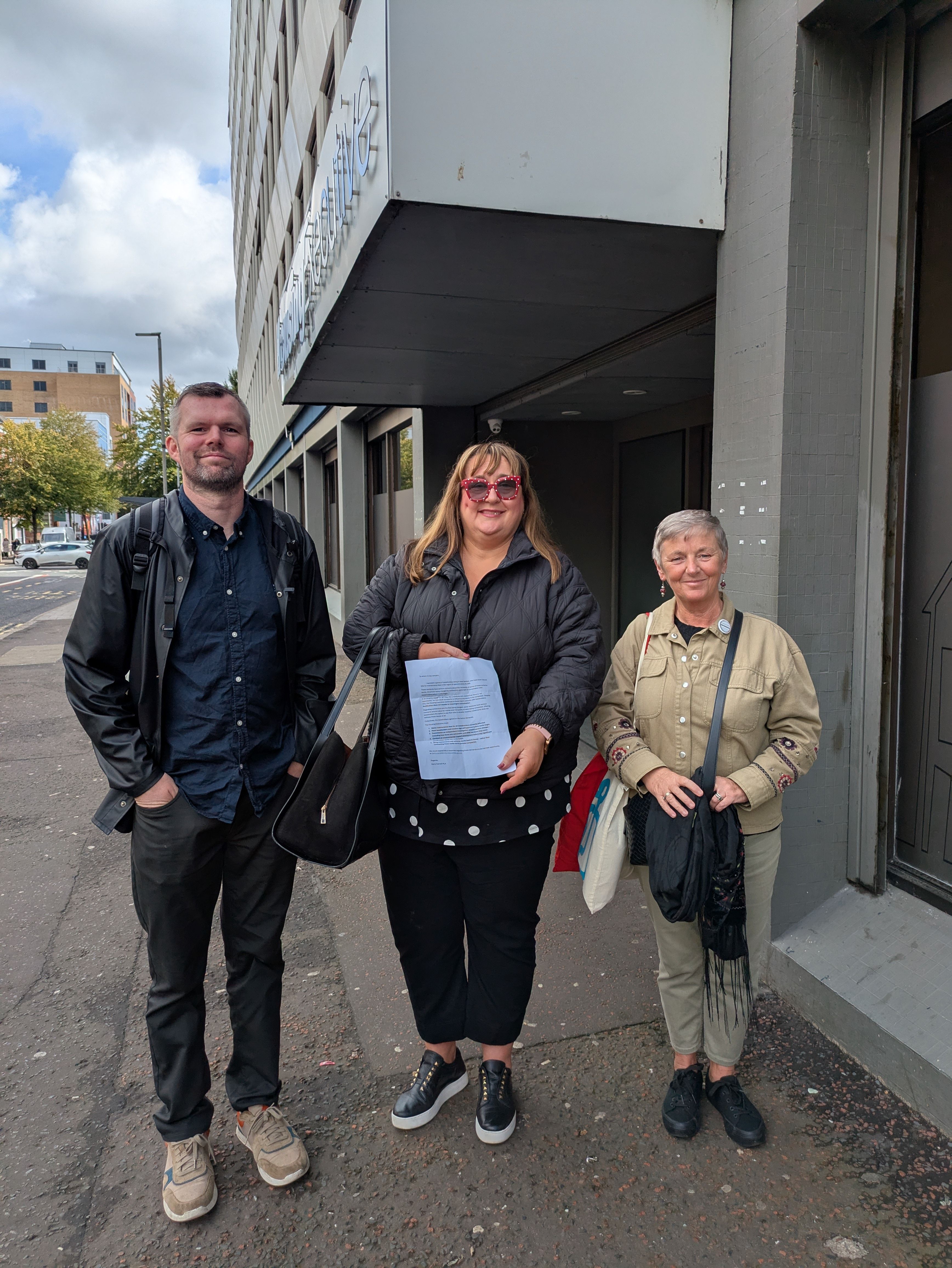 LETTER: Gerry Carroll MLA with Lisa McCombish-Brennan and Geraldine Kelly outside the Housing Executive office in Belfast city centre 