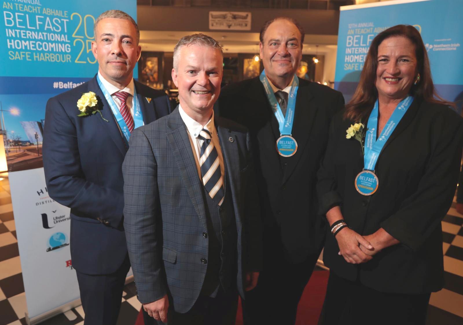 HOMECOMING HEROES: Malachy Ó Néill (second from left), Provost at Ulster University, presented Belfast Ambassador medals to Major Craig Costello of the NJ State Police, Mike Flannery and Diane Morrisey, food blogger of Connecticut 