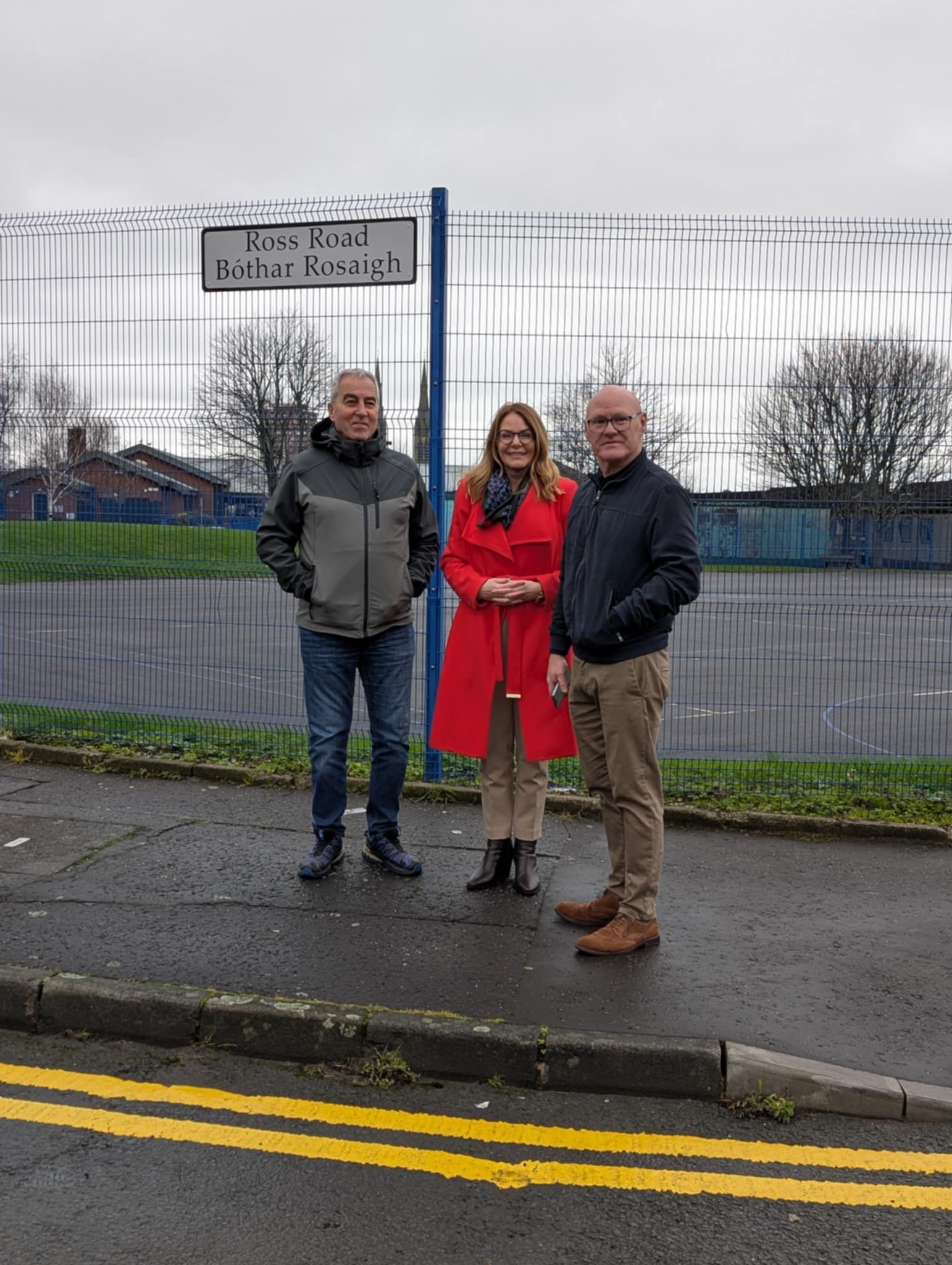 WELCOME: Pat Sheehan MLA, Councillor Tina Black and Paul Maskey MP outside St Peter\'s PS on Ross Road