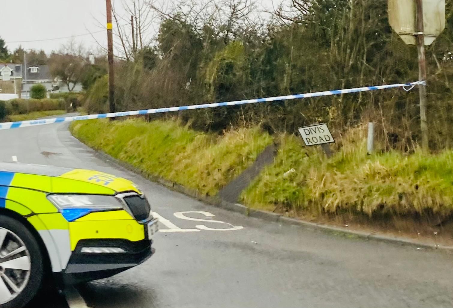 NO WAY THROUGH: Divis Road is currently cordoned off