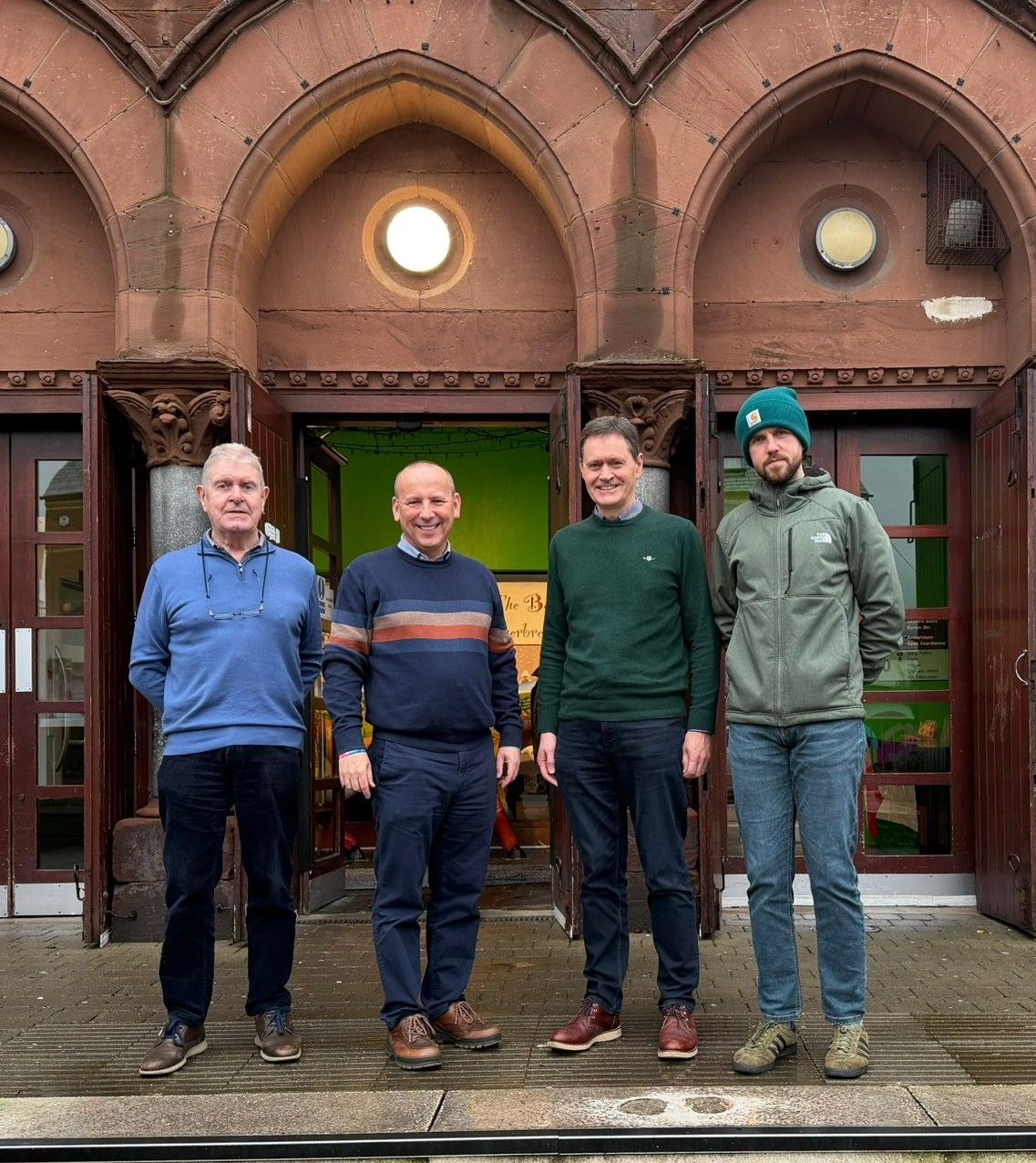 FÁILTE: Caoimhín Ó Seanáin, Oifigeach Turasóireachta/Tourism Officer at Cultúrlann, Rev David Moore, Rev Moore Casement, who will be preaching on 1 February, and Cónall Ó Corra, Stiúrthóir/Manager of Cultúrlann
