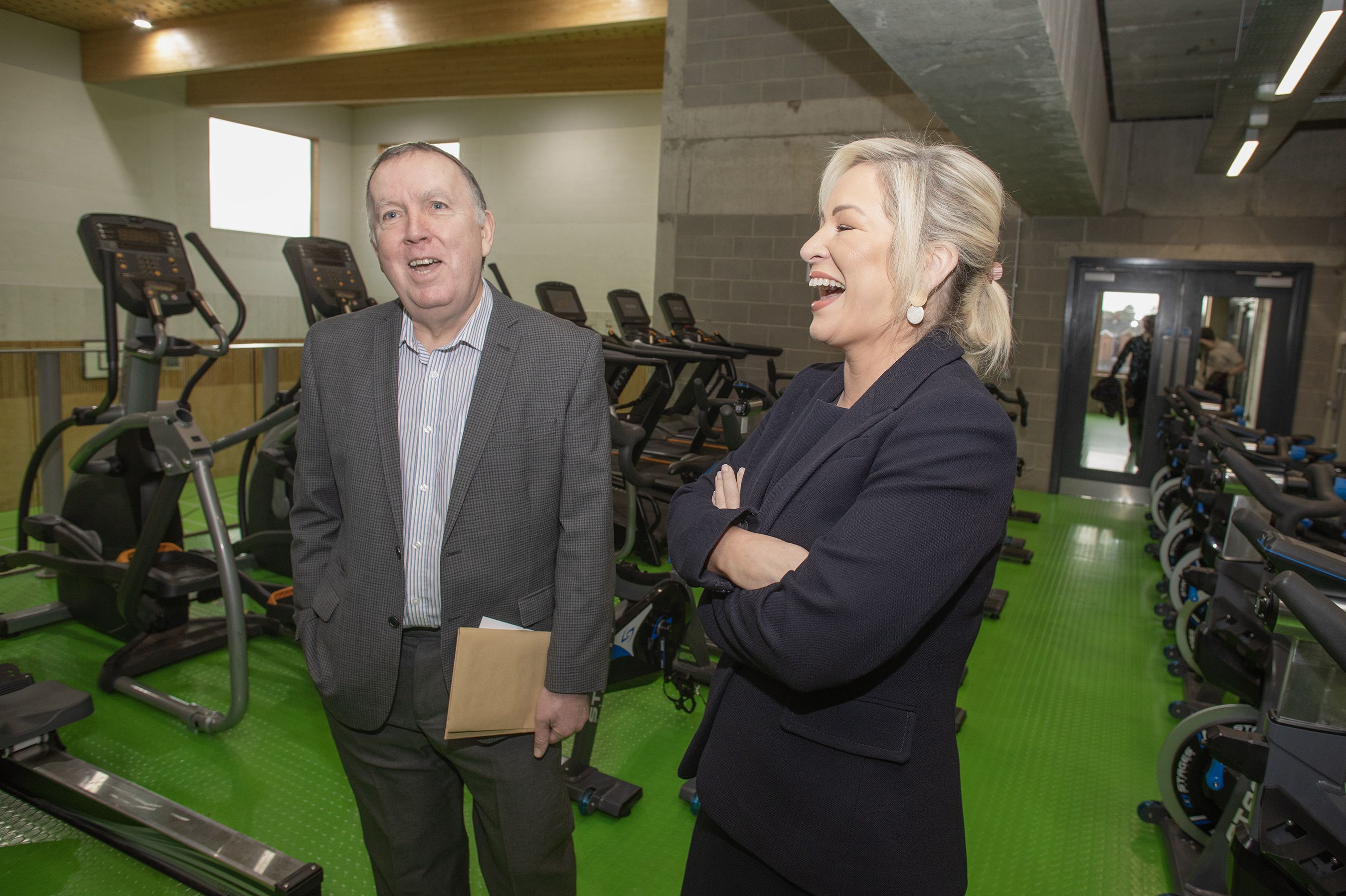 SPRAOI: First Minister Michelle O’Neill shares a joke with Spórtlann na hÉireann Chair Pilib Ó Ruanaidh