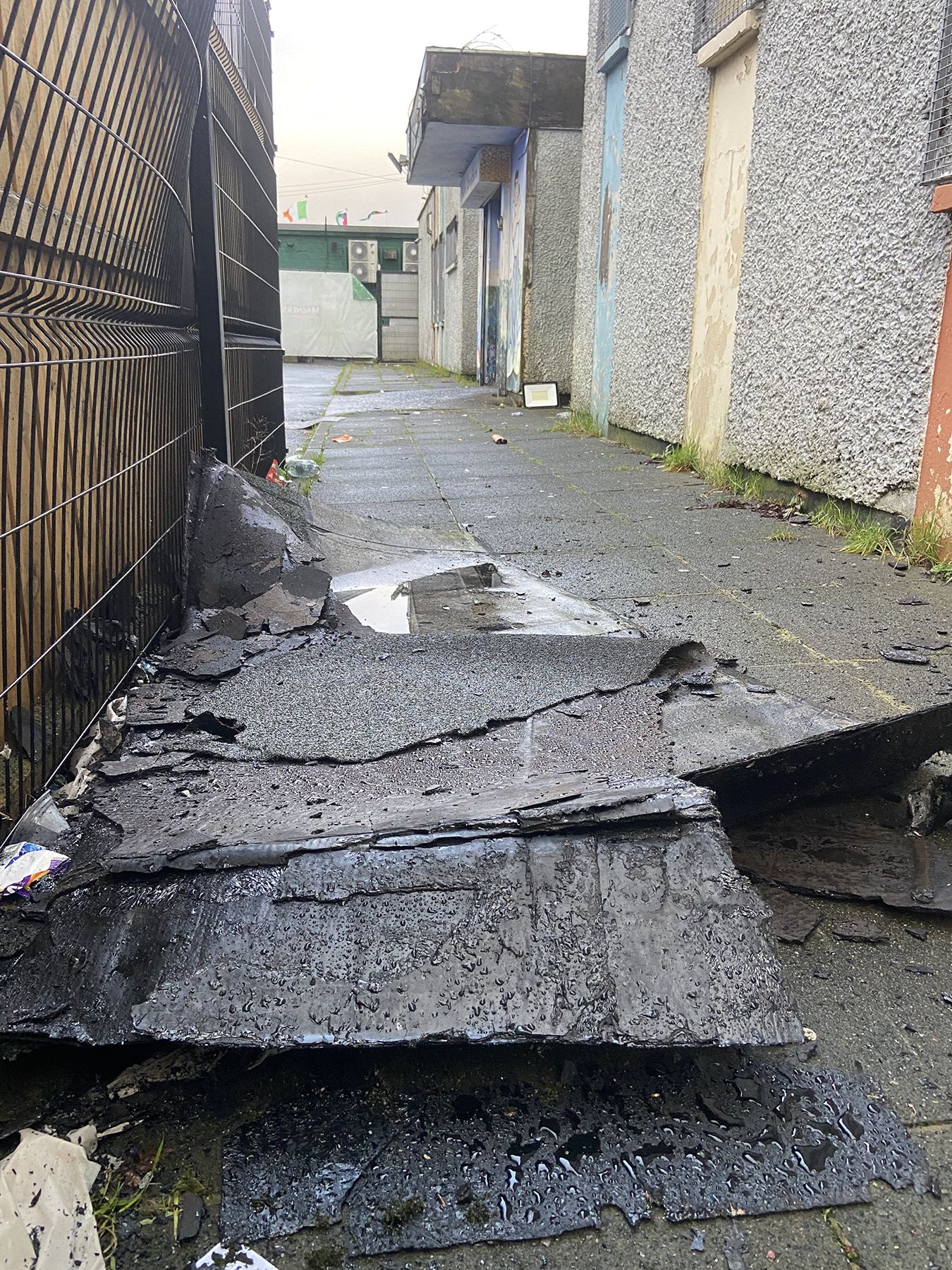 STORM DAMAGE: Part of the roof from Ardoyne Youth Club lies on the ground below