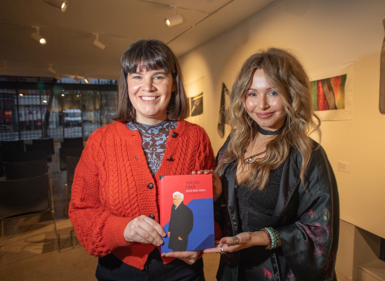 TAKING THE SILK ROAD: Business coach Caoilfhionn Buckley presents Sara O\'Neill with a copy of \'Tógáil Croi\' a book about pioneering architect Seán Mackel after the Small Business Roundtable