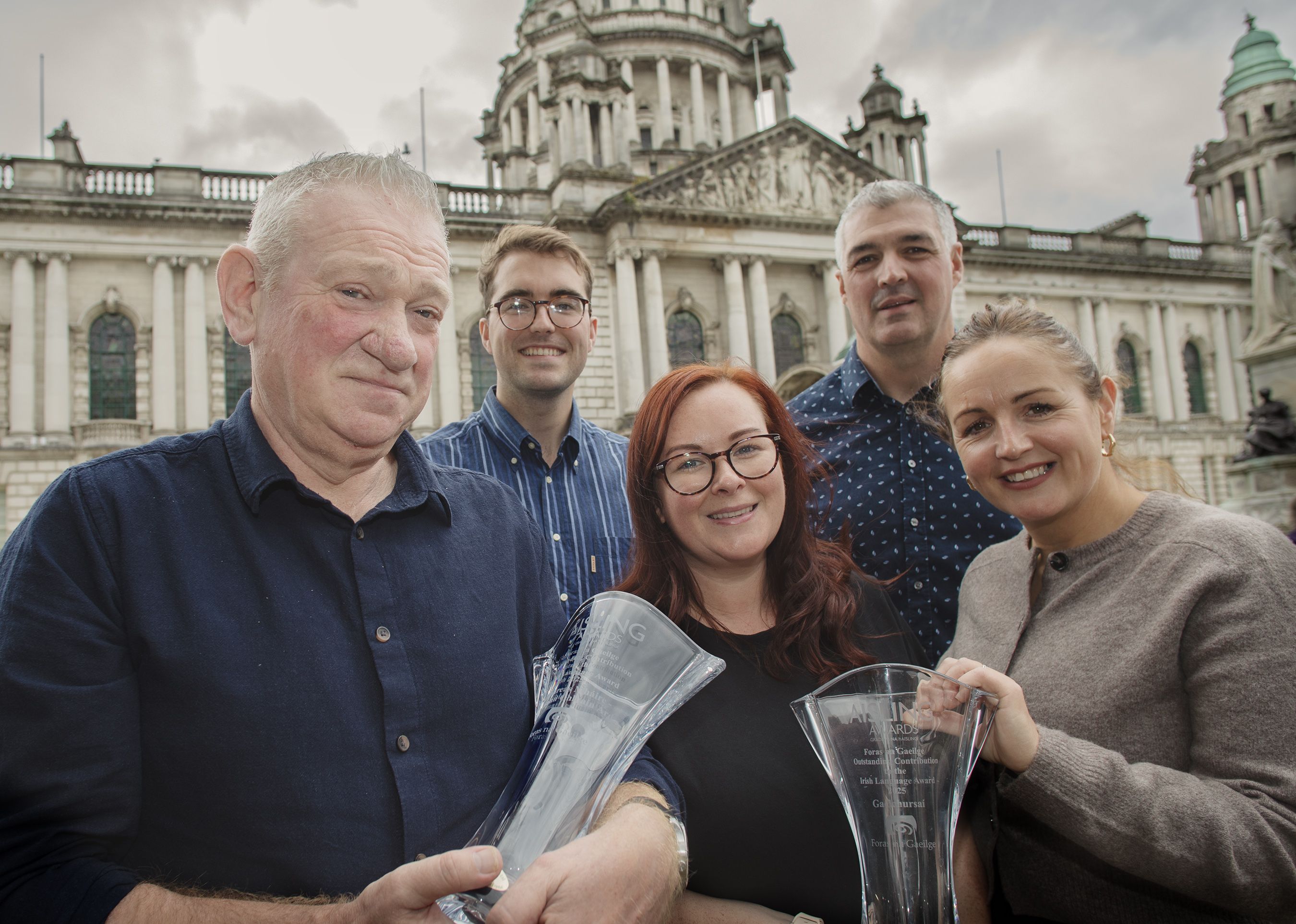 GRADAM NA GAEILGE: Pól Mac Fheilimidh ó Saibhreas Mháire - Cumann Chluain Árd, Aodhán Ó Baoill ó Belfast Media agus Conall Ó Máirtín ó Fhoras na Gaeilge le buaiteoirí na bliana seo caite, Meadhbh Clarke agus Frances Hand Ó Ghaelchúrsaí.