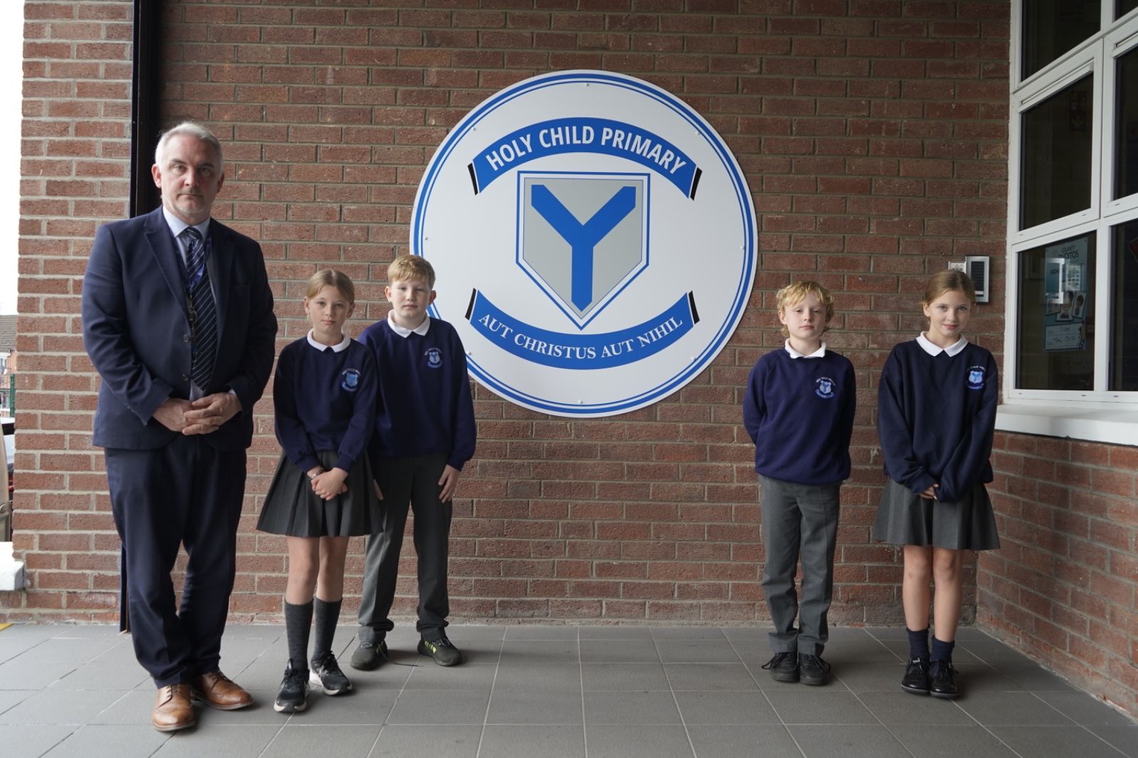 CONCERN: Conor Murphy, Principal of Holy Child Primary School, with pupils today