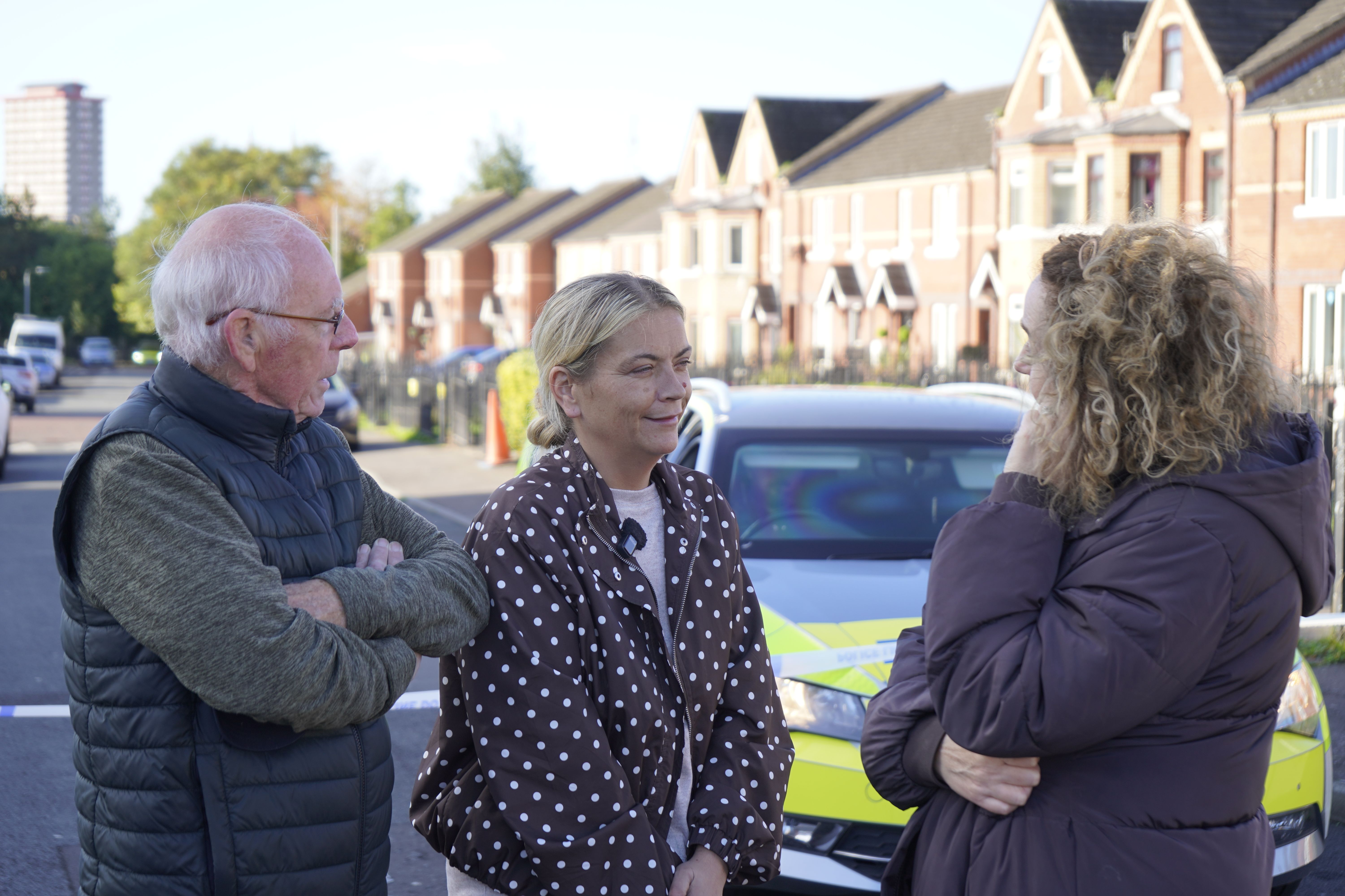 ATTACK: Frank Dempsey and Caral Ní Chúilín MLA reassure Nicola Nugent this morning. The mum-of-four\'s home was attacked overnight
