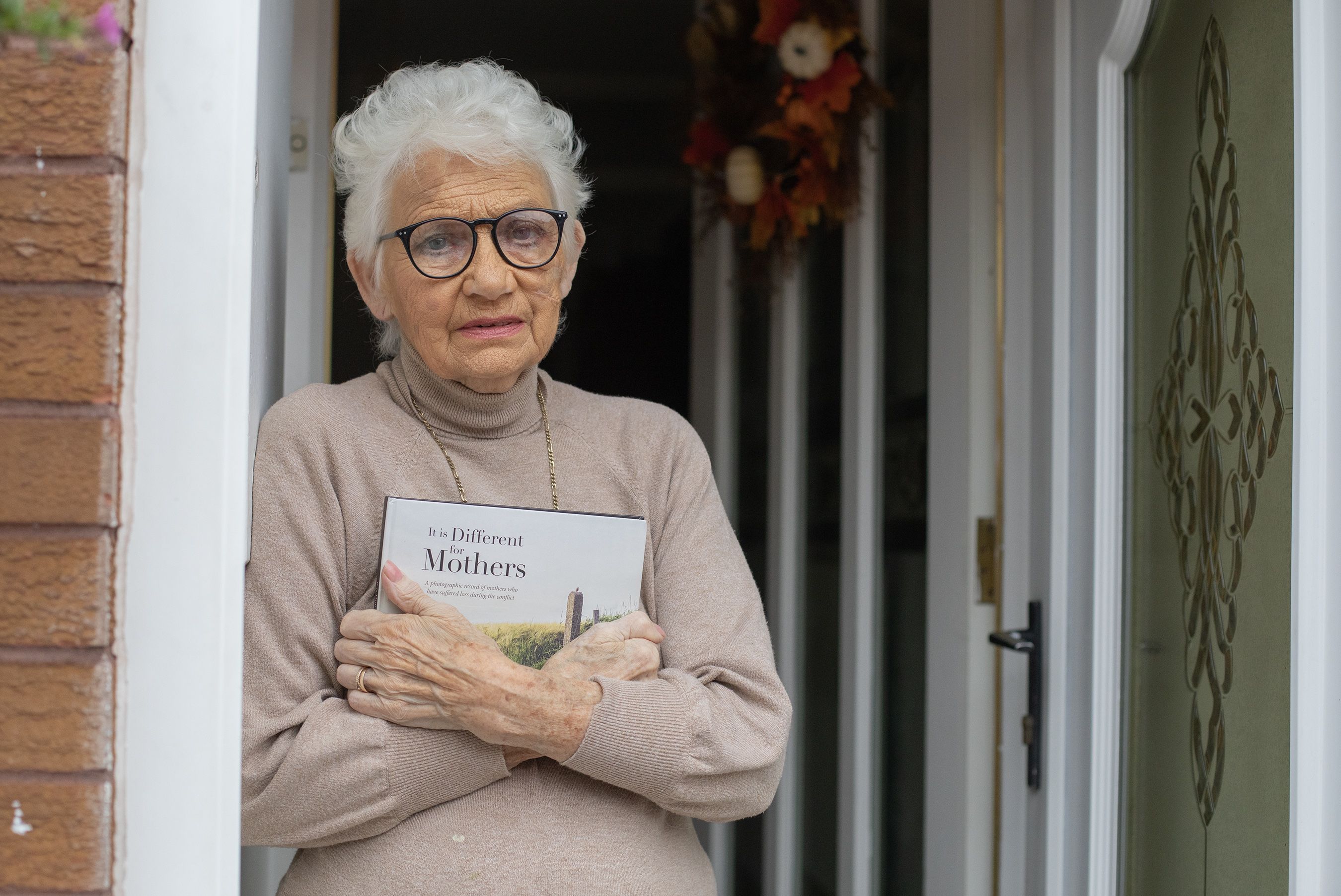 MEMORIES: Ann Maguire with the new book, \'It\'s Different for Mothers\', which was published last week