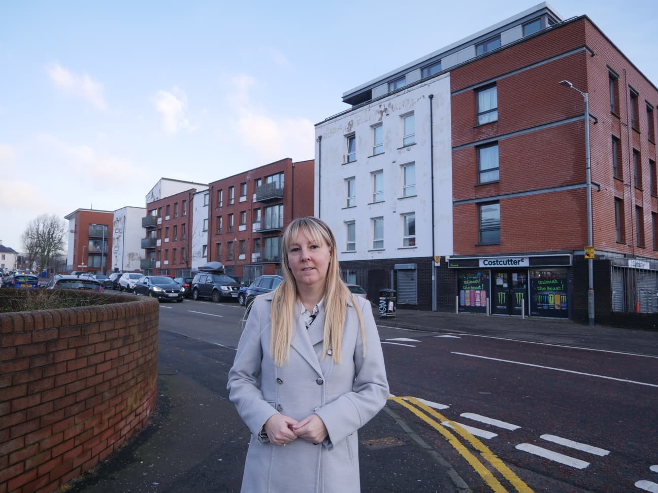 CALL FOR ACTION: Sinn Féin councillor Claire Canavan outside Ross Mill apartments