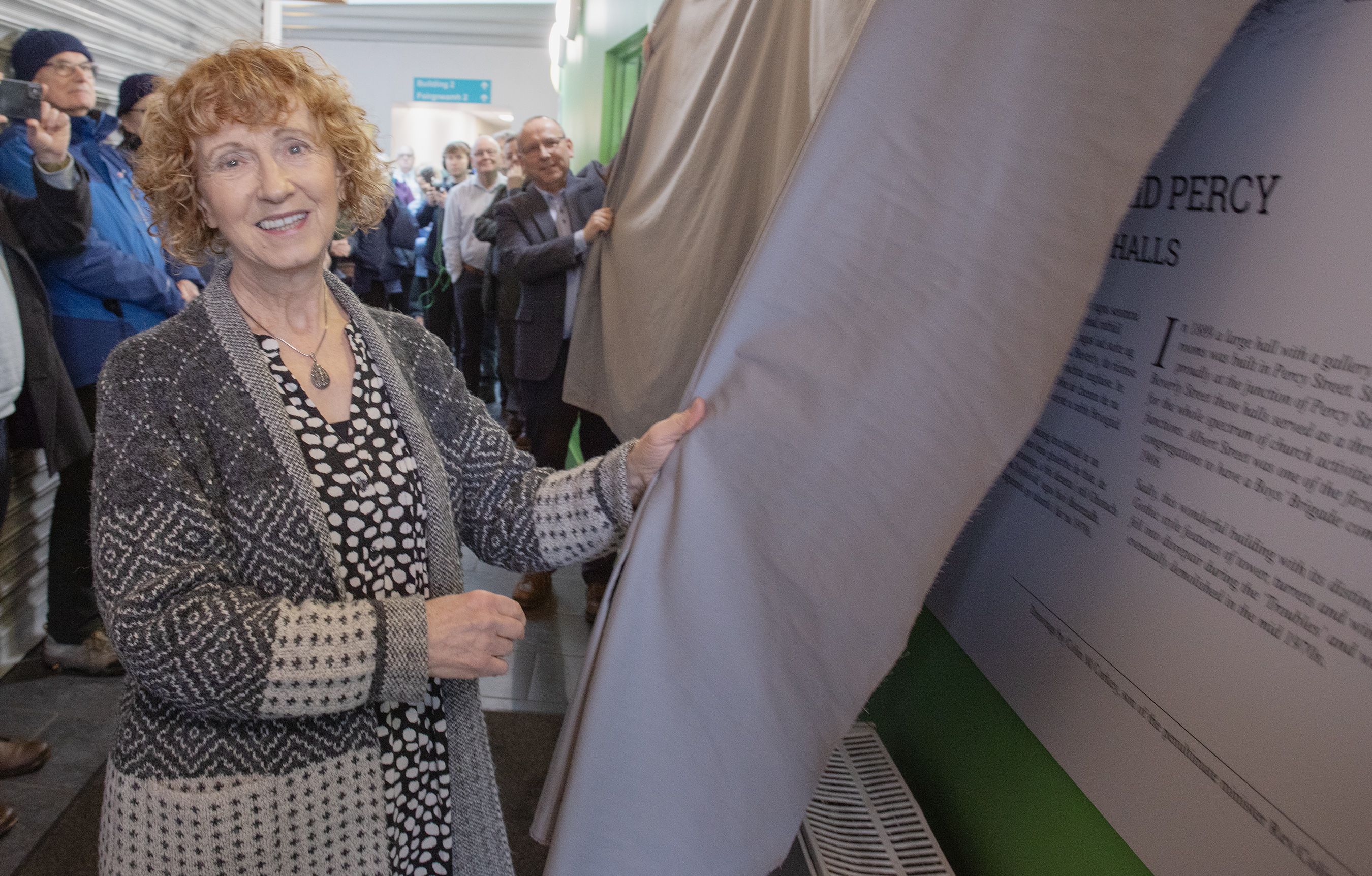 PROUD MOMENT: Viv Hunter and Rev David Moore unveil the plaque and artwork at the Maureen Sheehan Centre