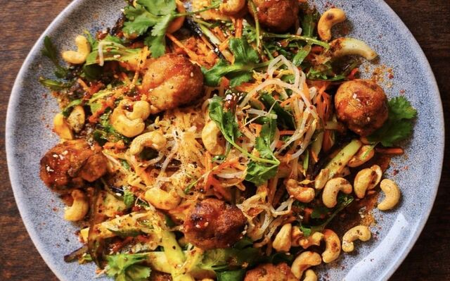 PLATING UP: Thai rice noodle salad with red curry pork meatballs