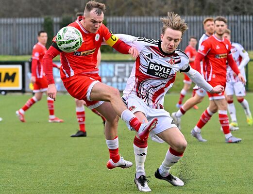 Soccer: Reds thump Crues in North Belfast thriller