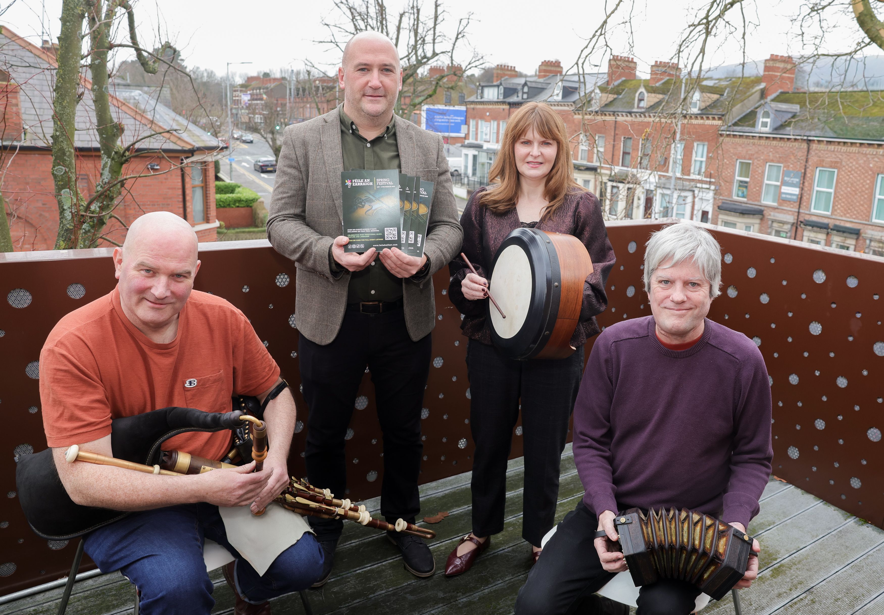 SPRING FESTIVAL: Kevin Gamble (Féile an Phobail Director), Economy Minister Caoimhe Archibald MLA with musicians Cormac Ó Briain and Jason O\'Rourke