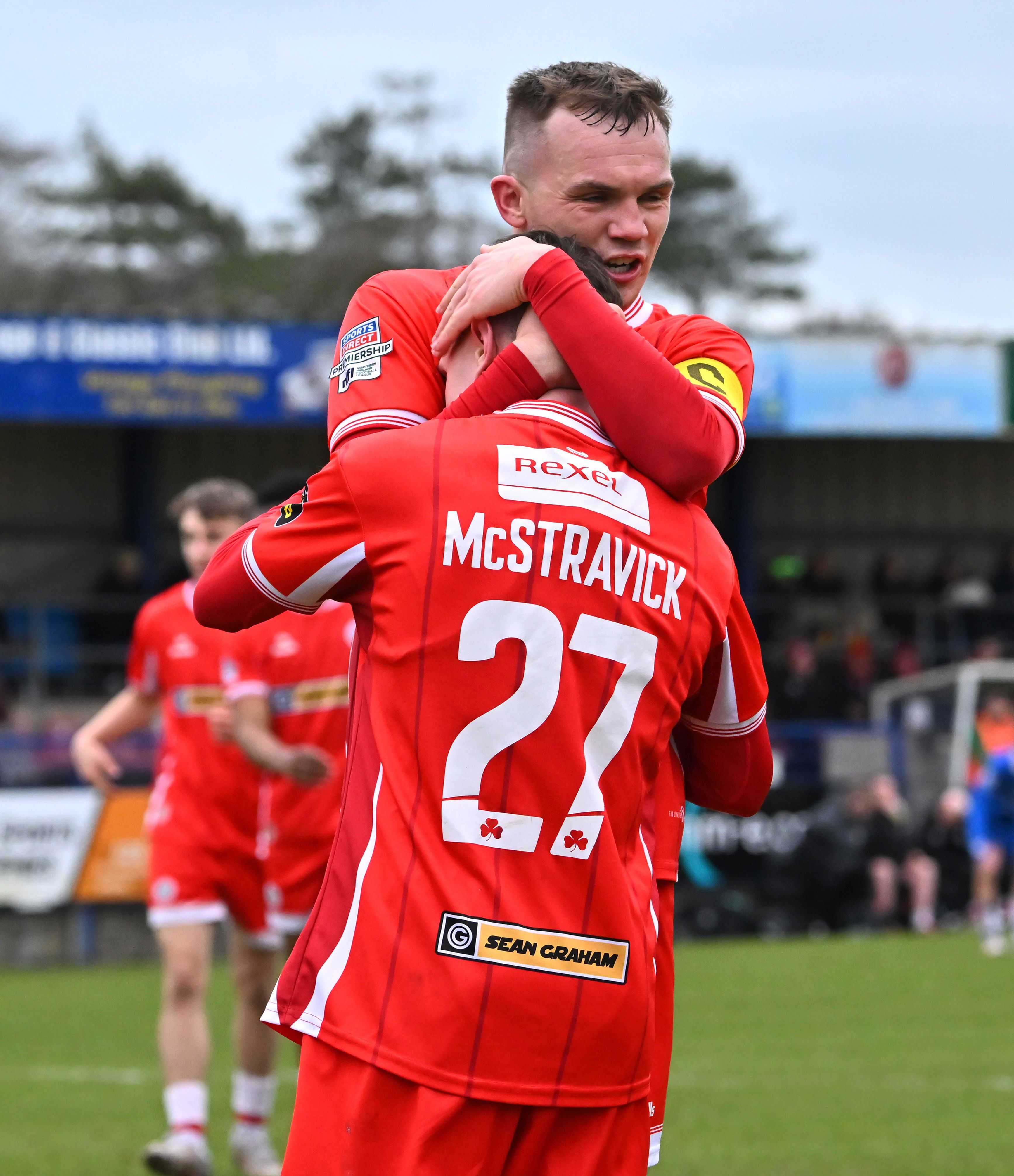 TAKE THAT: Liam McStravick celebrated with captain Rory Hale after scoring a vital goal