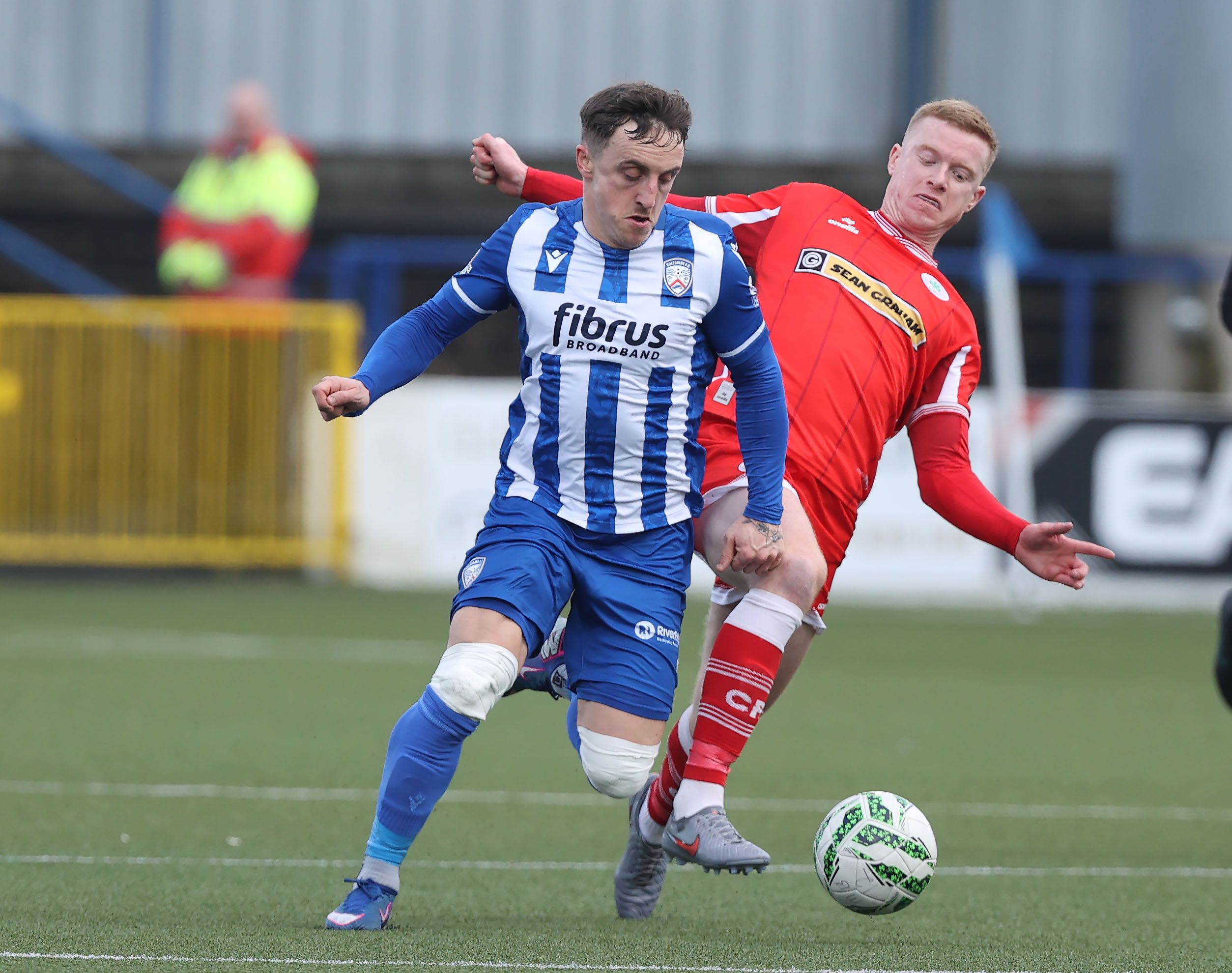 TIGHT CONTEST: Joel Cooper and Joshua Kelly contest for a ball