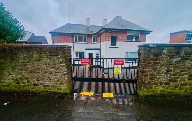 Simon Community move to Glen Road 'continuing' in wake of hoax security alert