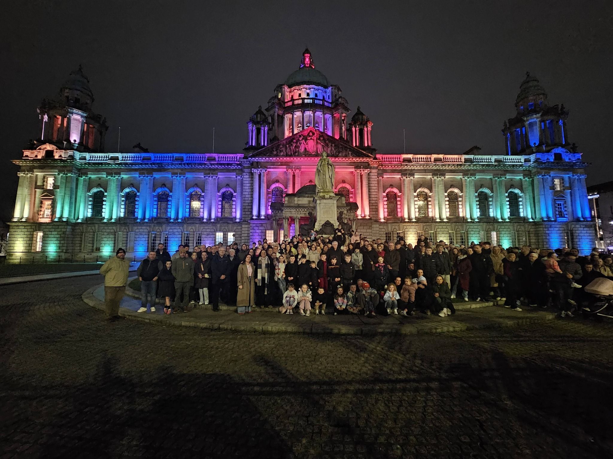 RAINBOW: Friends and family of Bláthnaid outside Belfast City Hall on Monday night