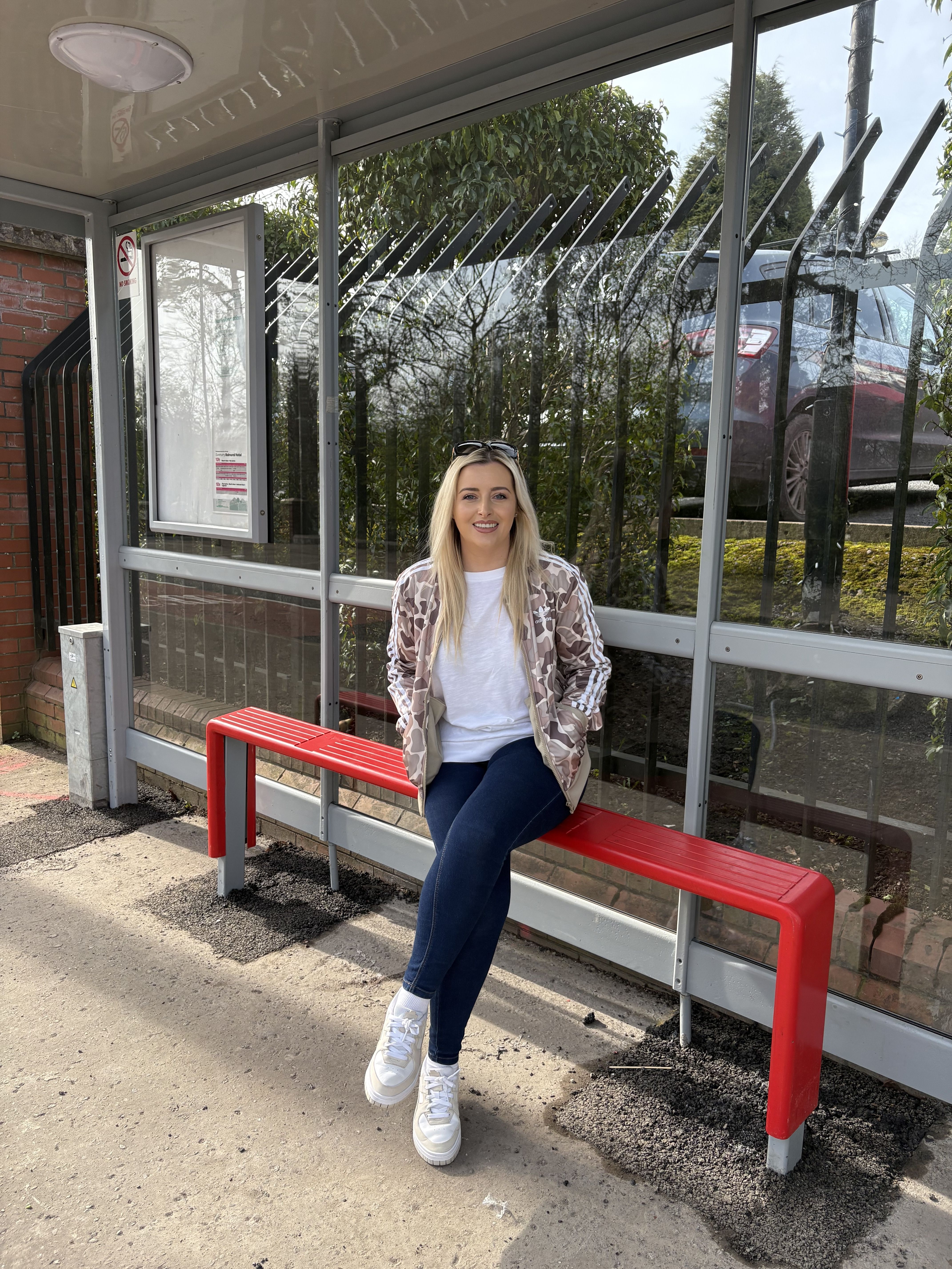 WELCOME: West Belfast MLA Órlaithí Flynn at the new bus shelter on Blacks Road