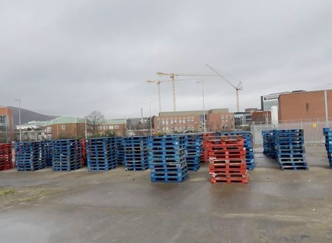 HERE WE GO AGAIN: Pallets at the controversial asbestos bonfire which is back again this year near the Westlink