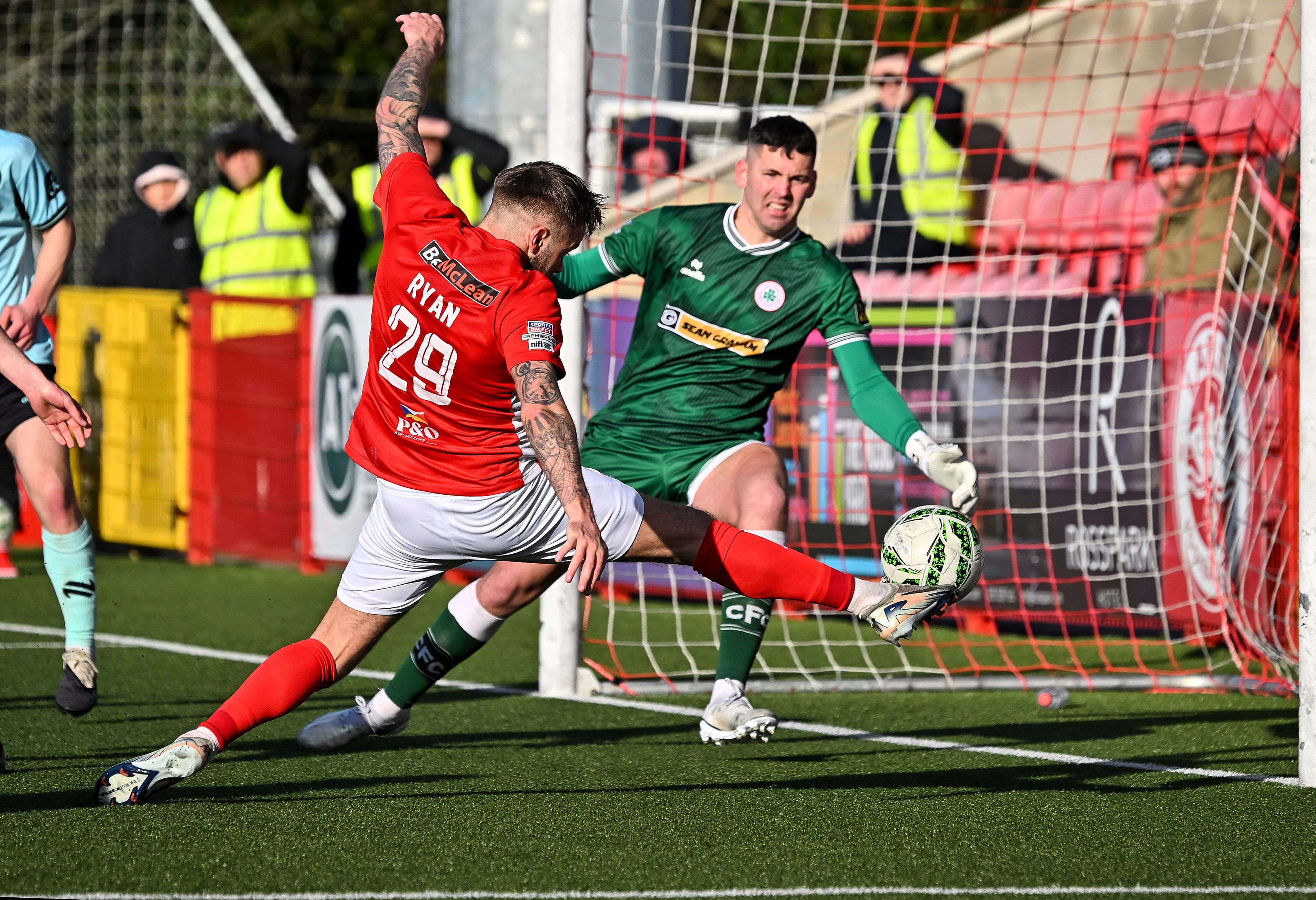 ON THE MARCH: Andy Ryan slots home for Larne