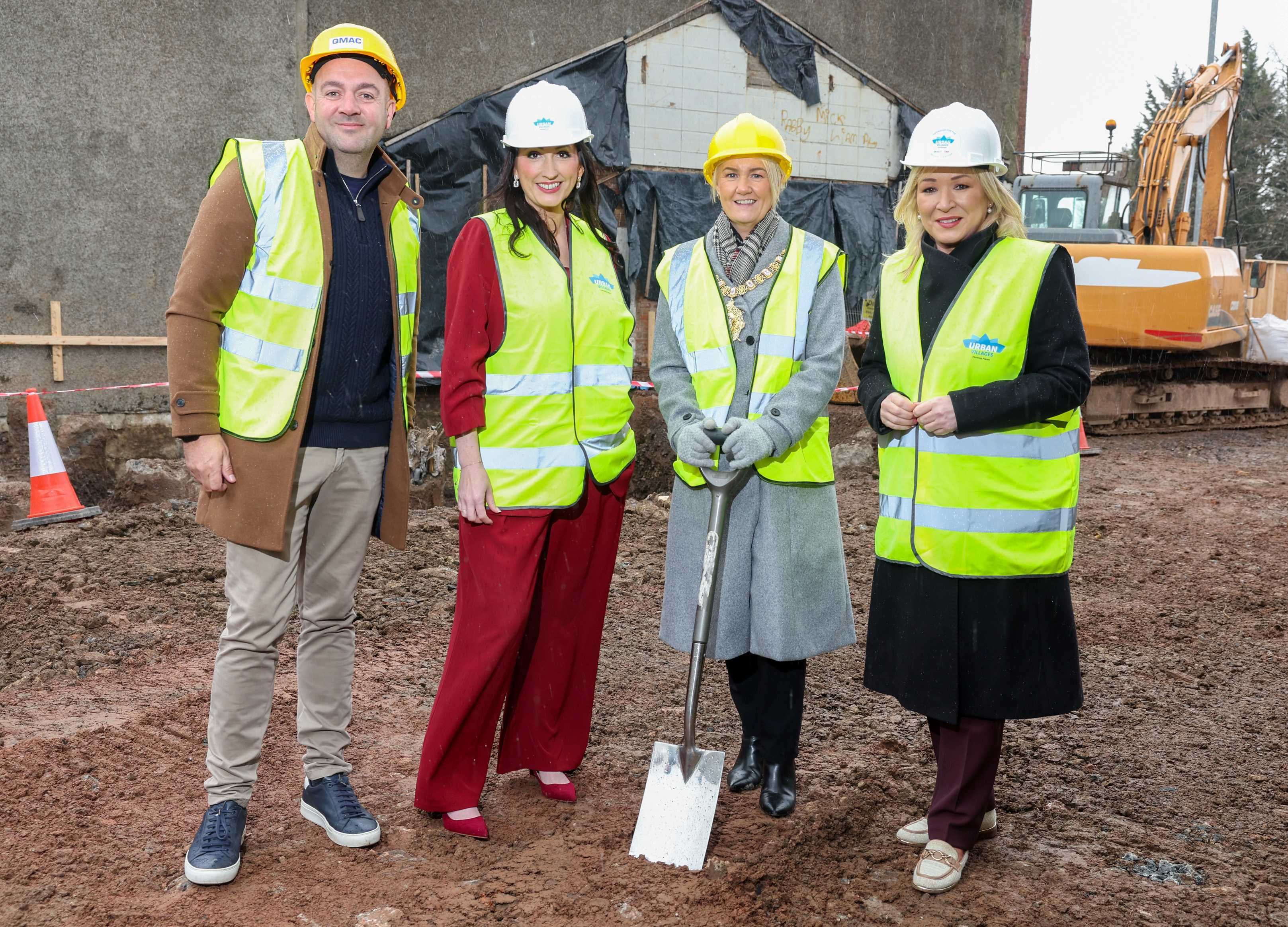 FIRST CUT: Thomas Turley, Director with Ardoyne Youth Enterprise, Deputy First Minister Emma Little-Pengelly, Lord Mayor of Belfast Councillor Tracy Kelly, and First Minister Michelle O\'Neill