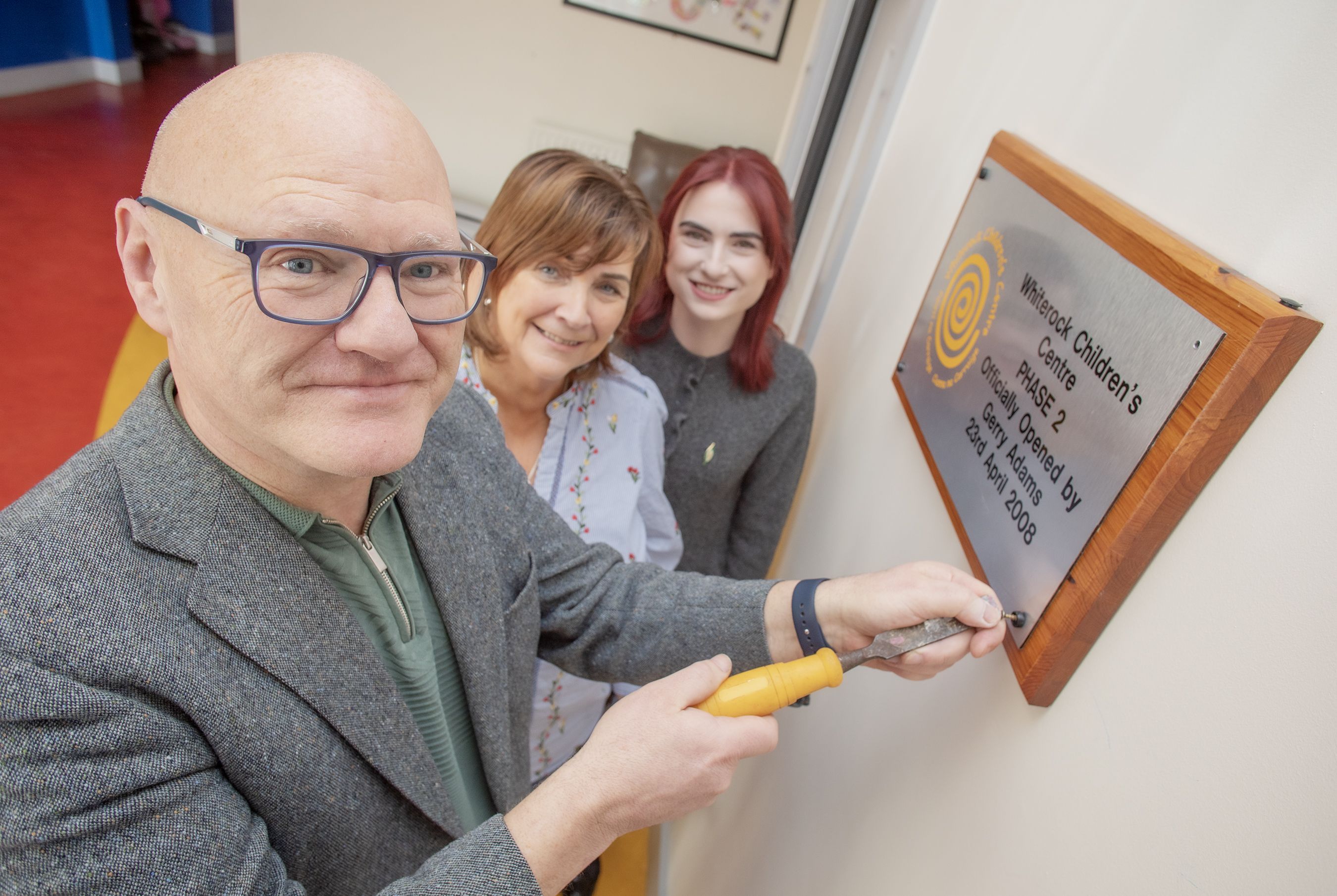 MOVING OUT: Whiterock Children\'s Centre Manager Deirdre Walsh with Paul Maskey MP and Councillor Róis-Máire Donnelly