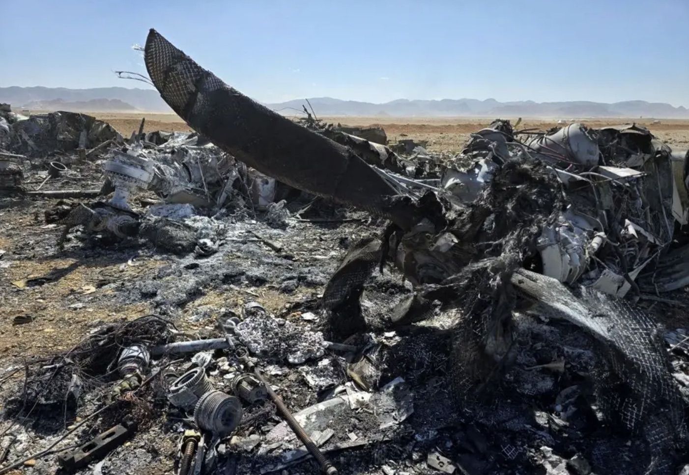 WRECKAGE: Two US C130 troop/cargo planes and a number of helicopters were destroyed in a \'rescue operation\' that remains shrouded in mystery