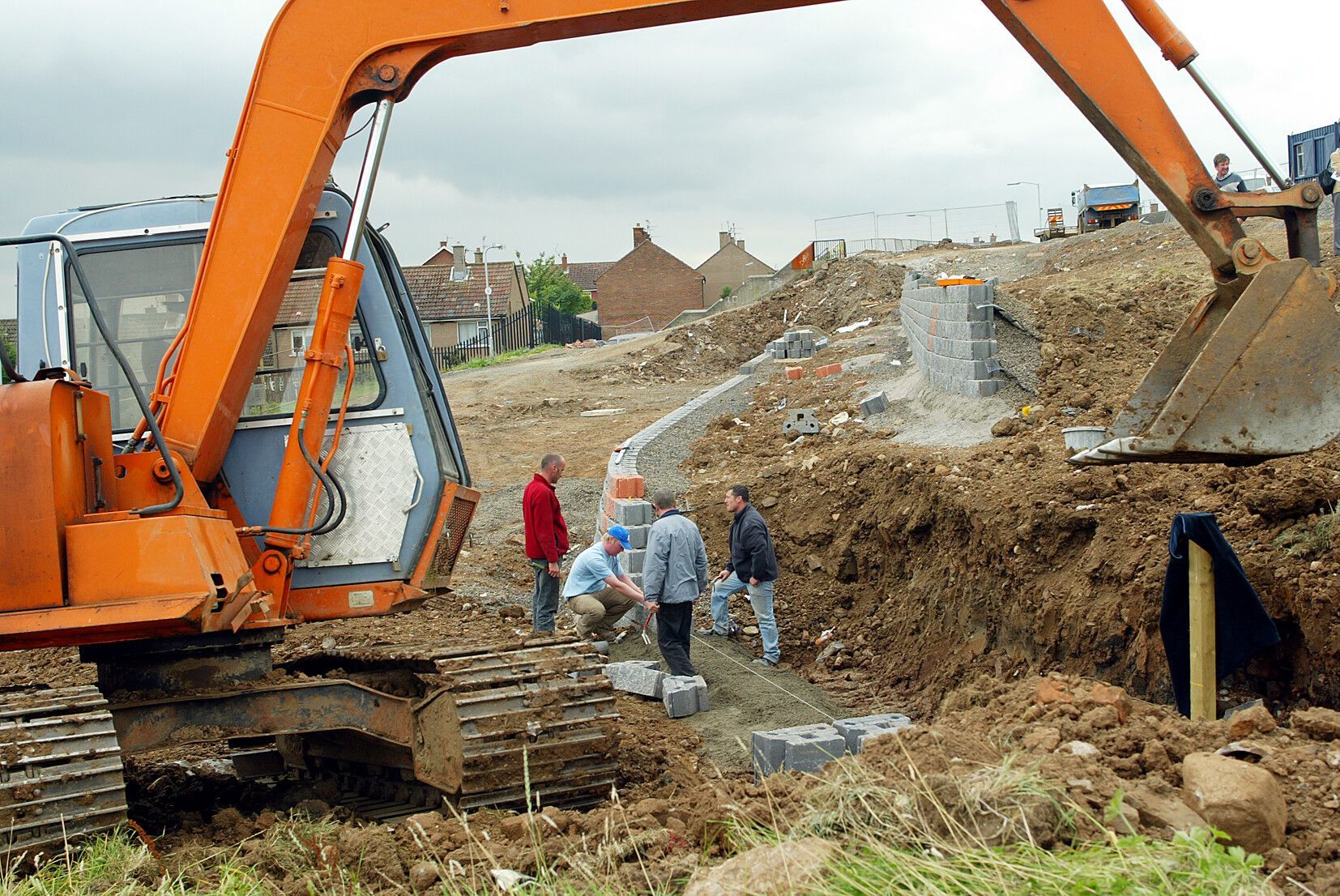 BUILDING BLOCKS: Workers on a housing development in West Belfast
