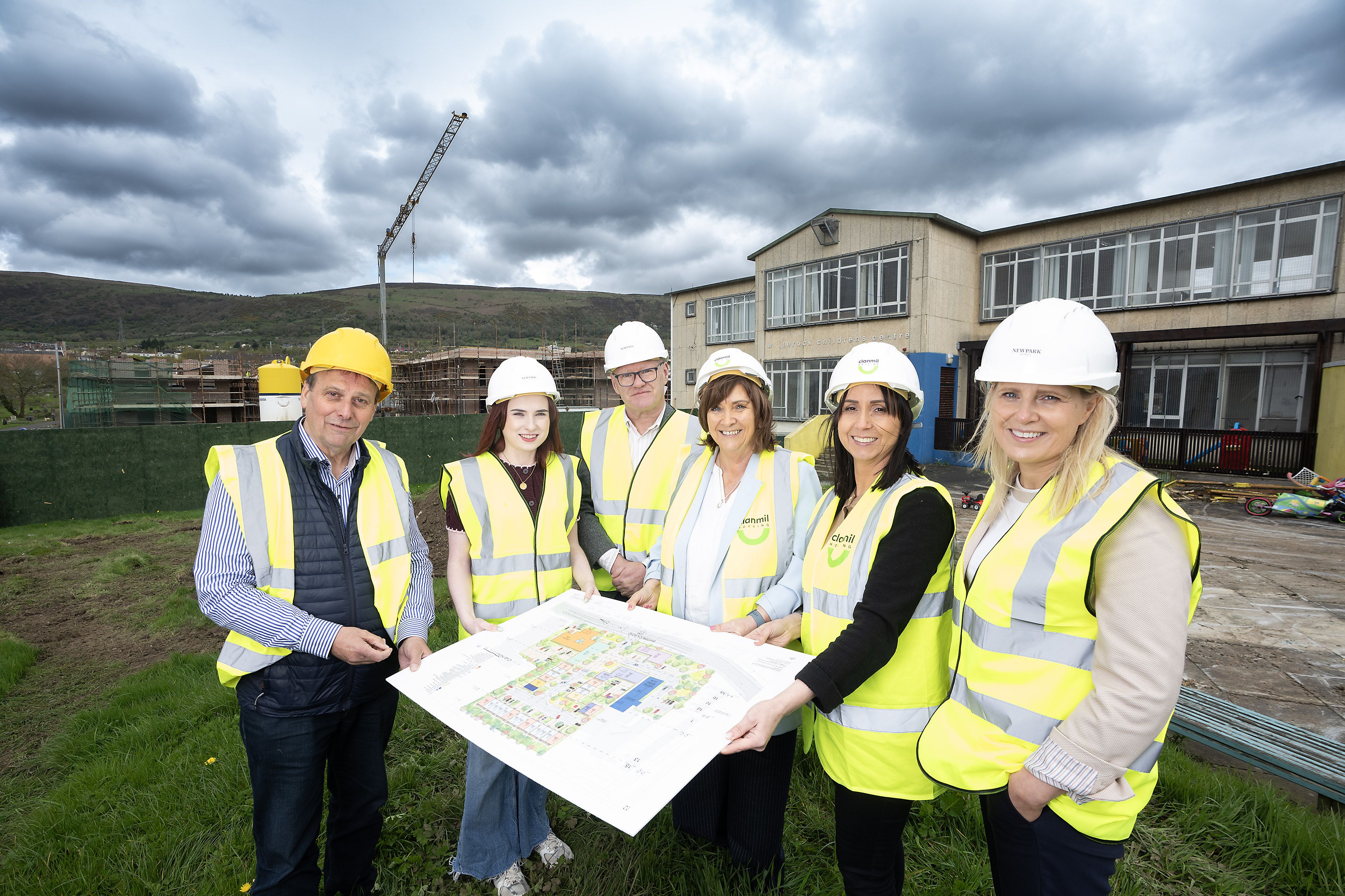 FAMILY HOMES: Basil O’Malley, Newpark Homes; Councillor Róis-Máire Donnelly; Paul Maskey MP; Deirdre Walsh, Whiterock Children’s Centre; Denise Doherty, Clanmil Housing; Kathryn Forde, Newpark Homes