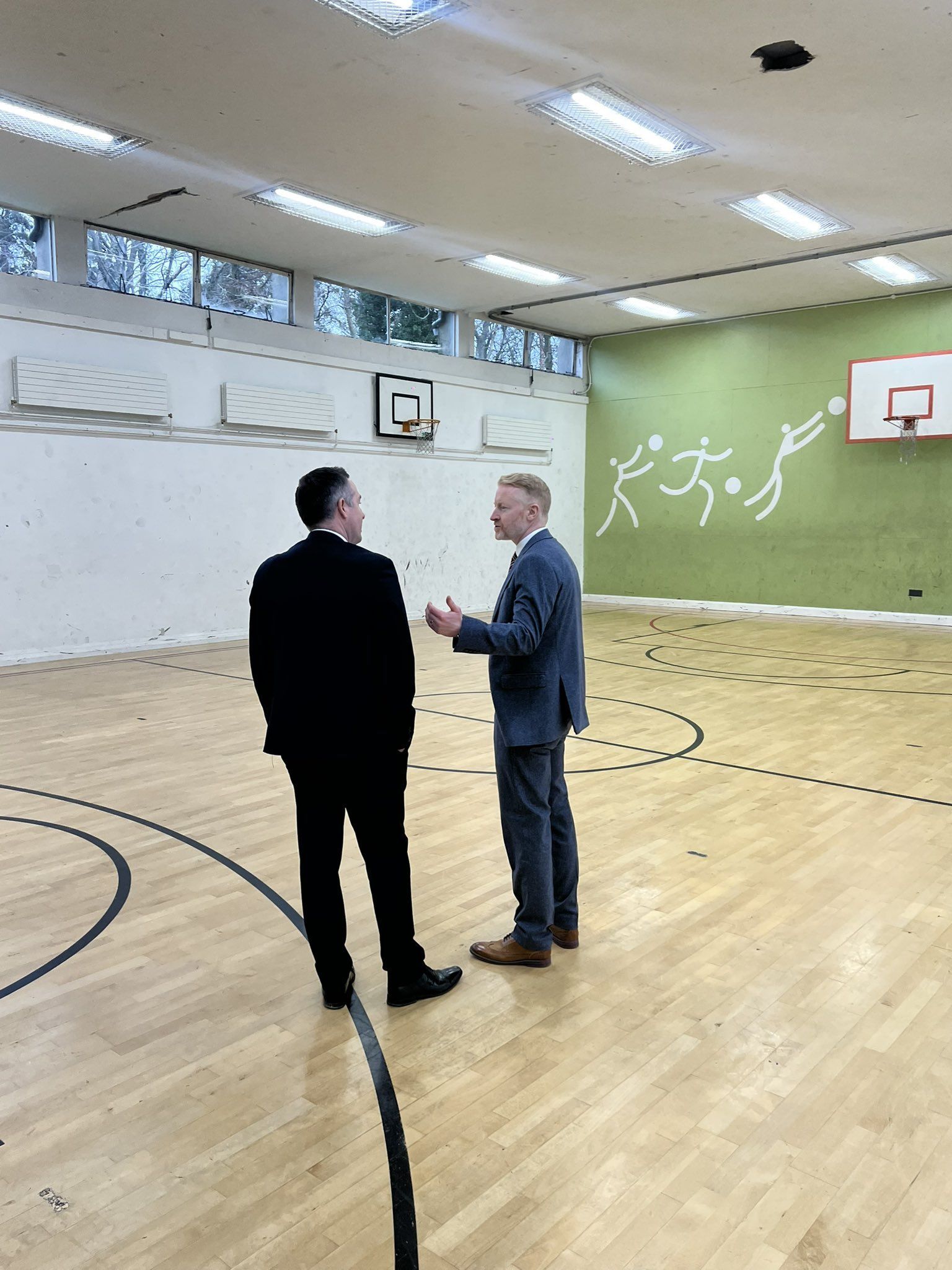 NEW SPORTS HALL NEEDED: Principal Brendan McComb with Education Minister Paul Givan who visited the school in 2024