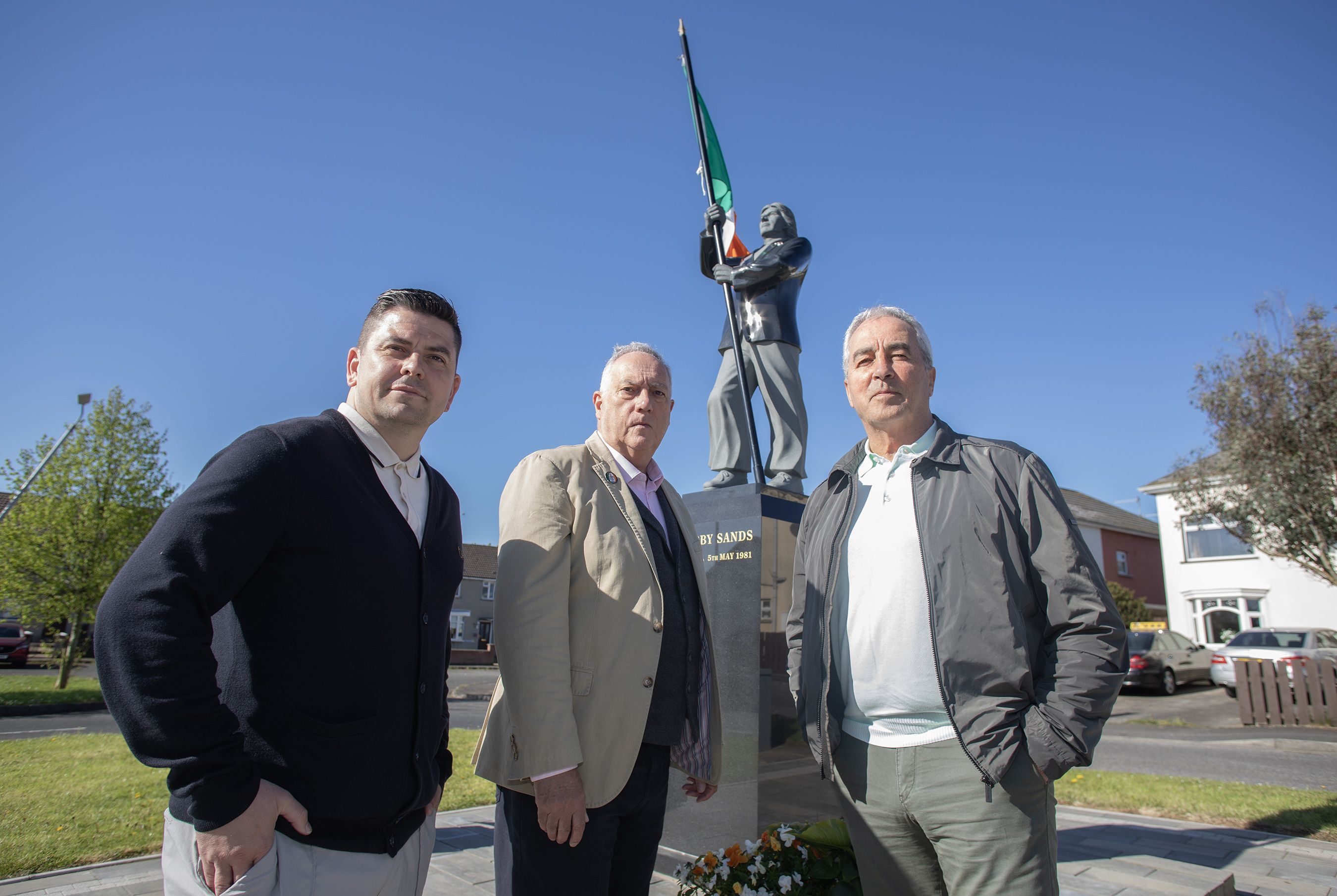 PRIDE: Danny Baker MLA, Councillor Séanna Walsh and Pat Sheehan MLA at the Bobby Sands statue in Twinbrook
