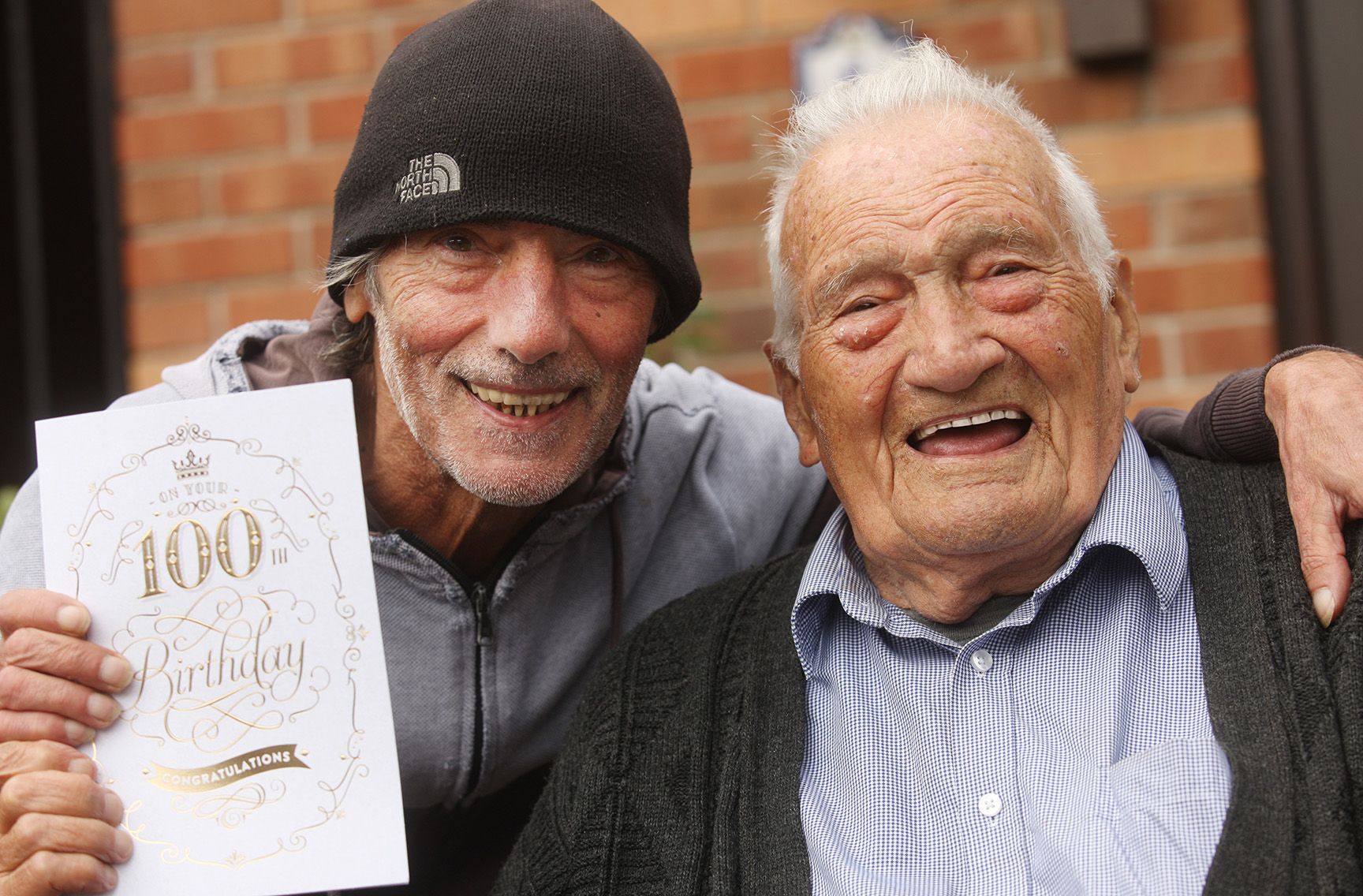 POPULAR: Terry Sharpe with his son, Terry Jr on his 100th birthday