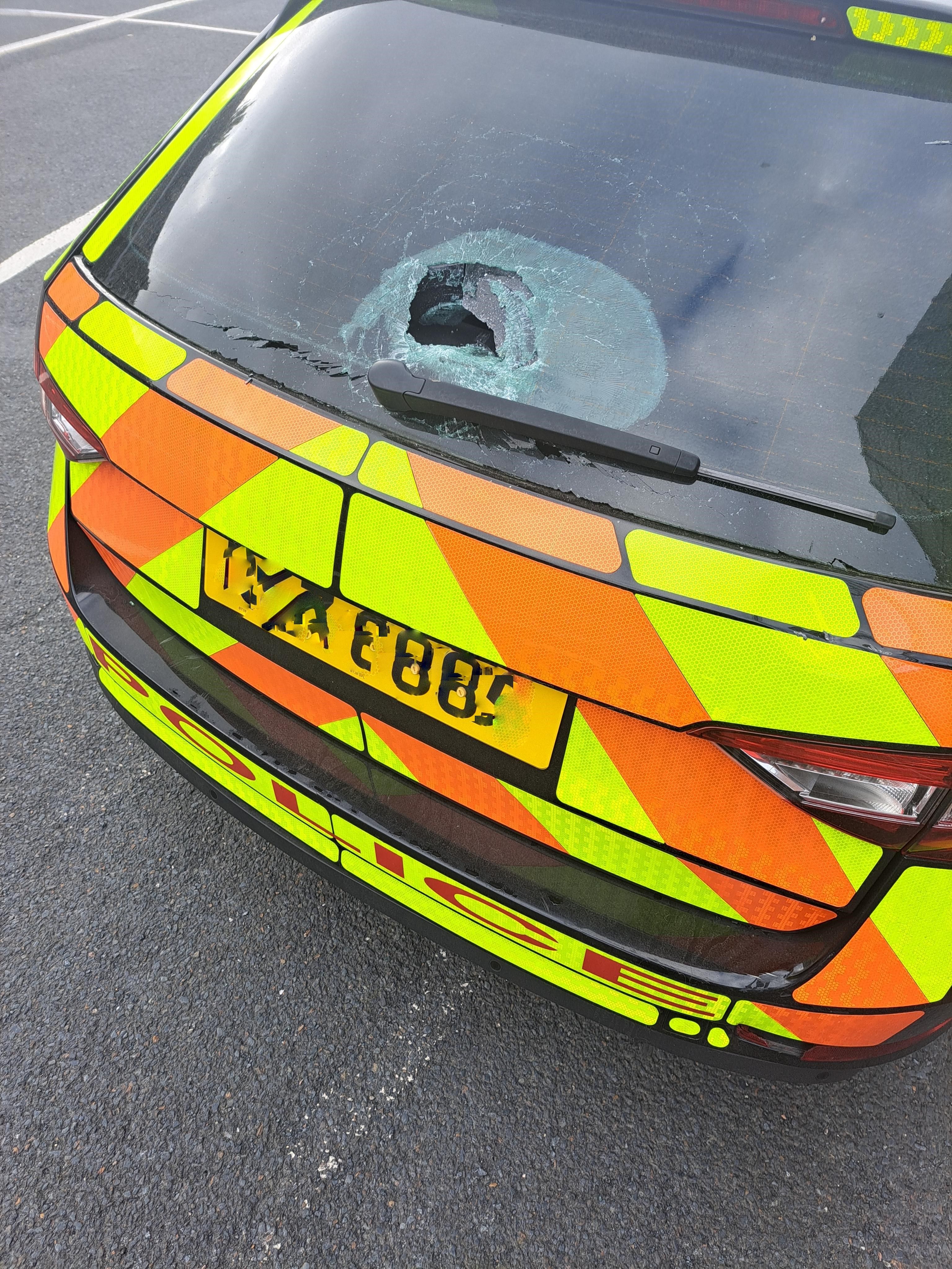 OFF THE ROAD: One of the damaged police vehicles