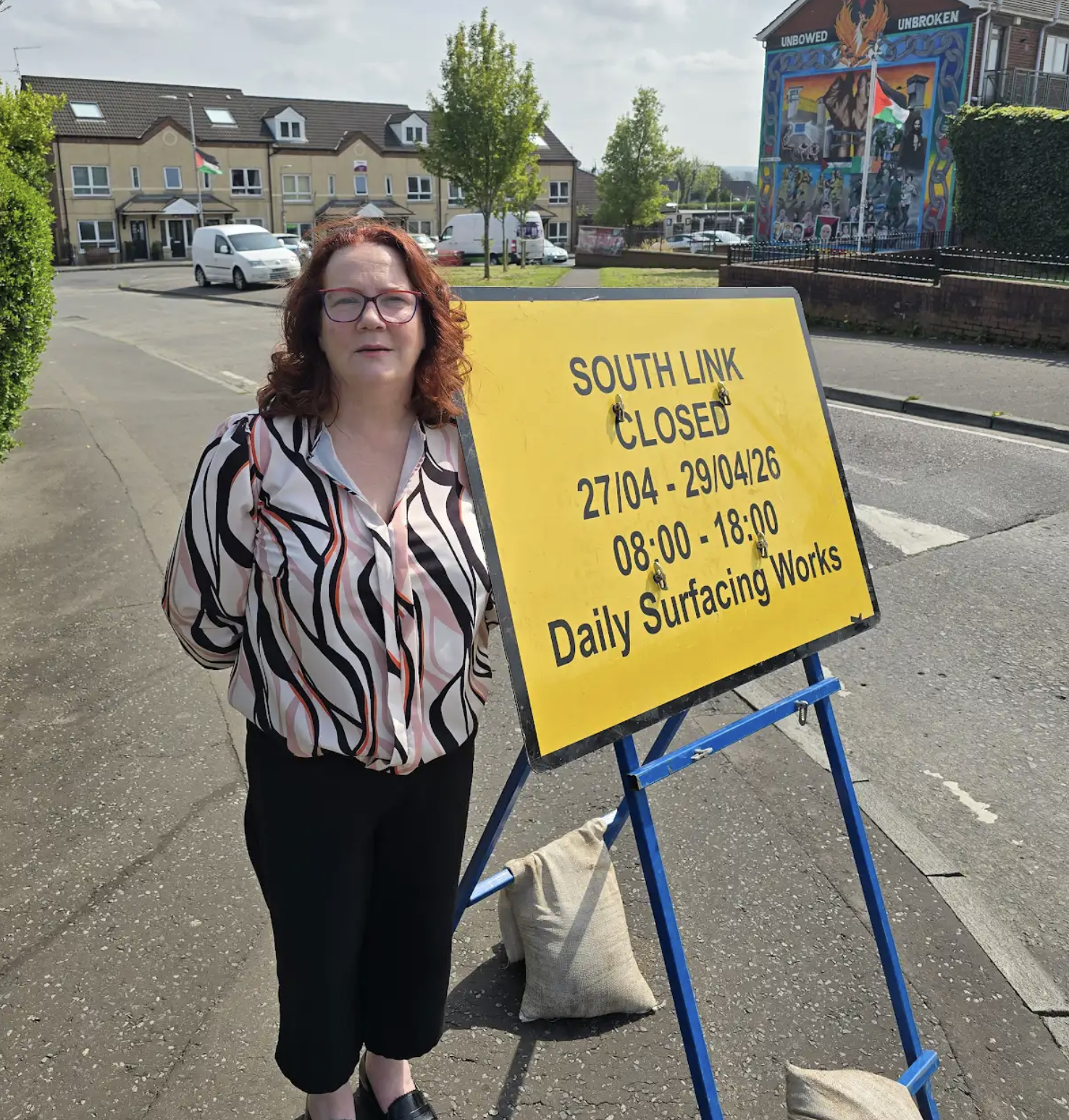 SIGN OF THE TIMES: Cllr Aine McCabe has welcomed the resurfacing