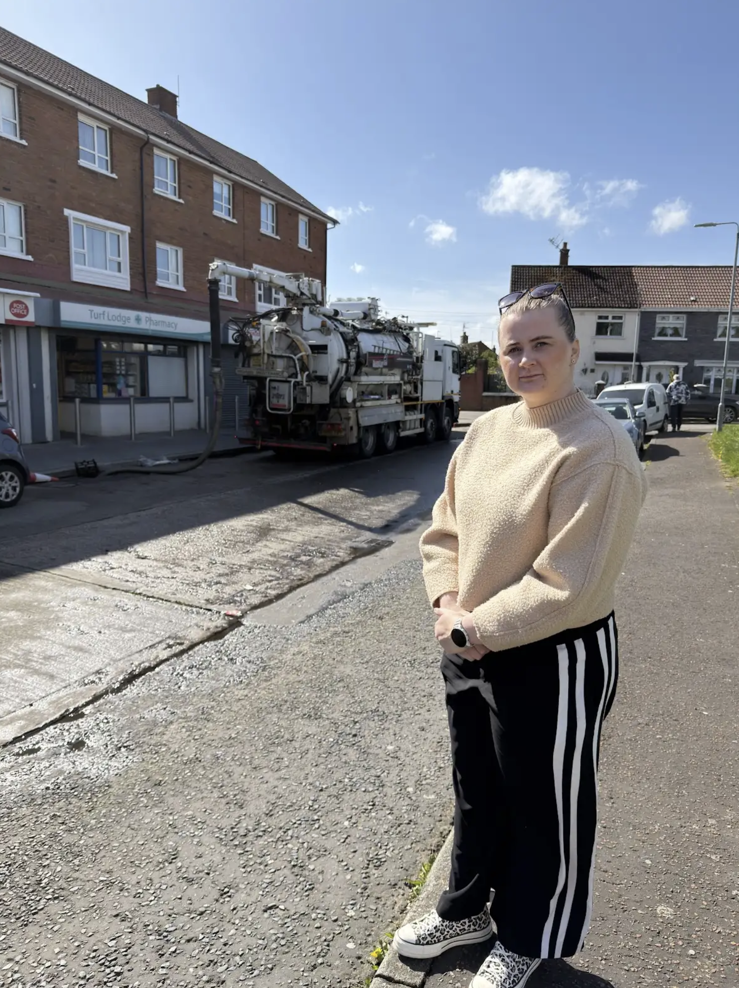 VISIT: Aisling Reilly MLA has highlighted flooding issues around Turf Lodge shops