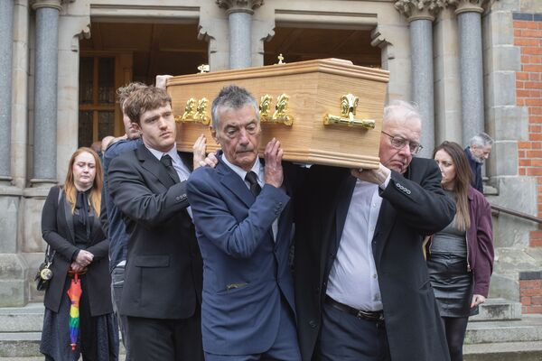 Terry Sharpe lived a life marked by faith, humour, dignity and love, funeral hears 