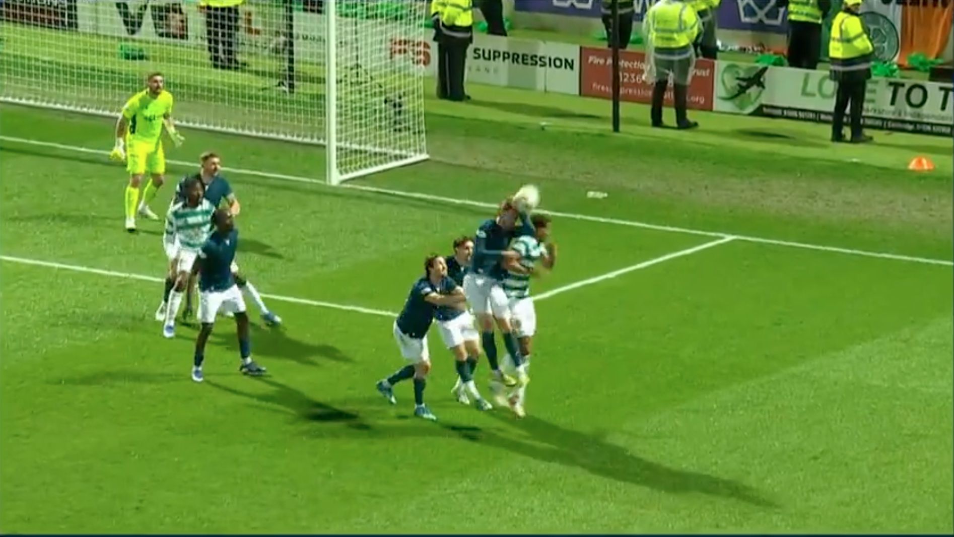 PENALTY OR NOT: Sam Nicholson is penalised for handball following a VAR review