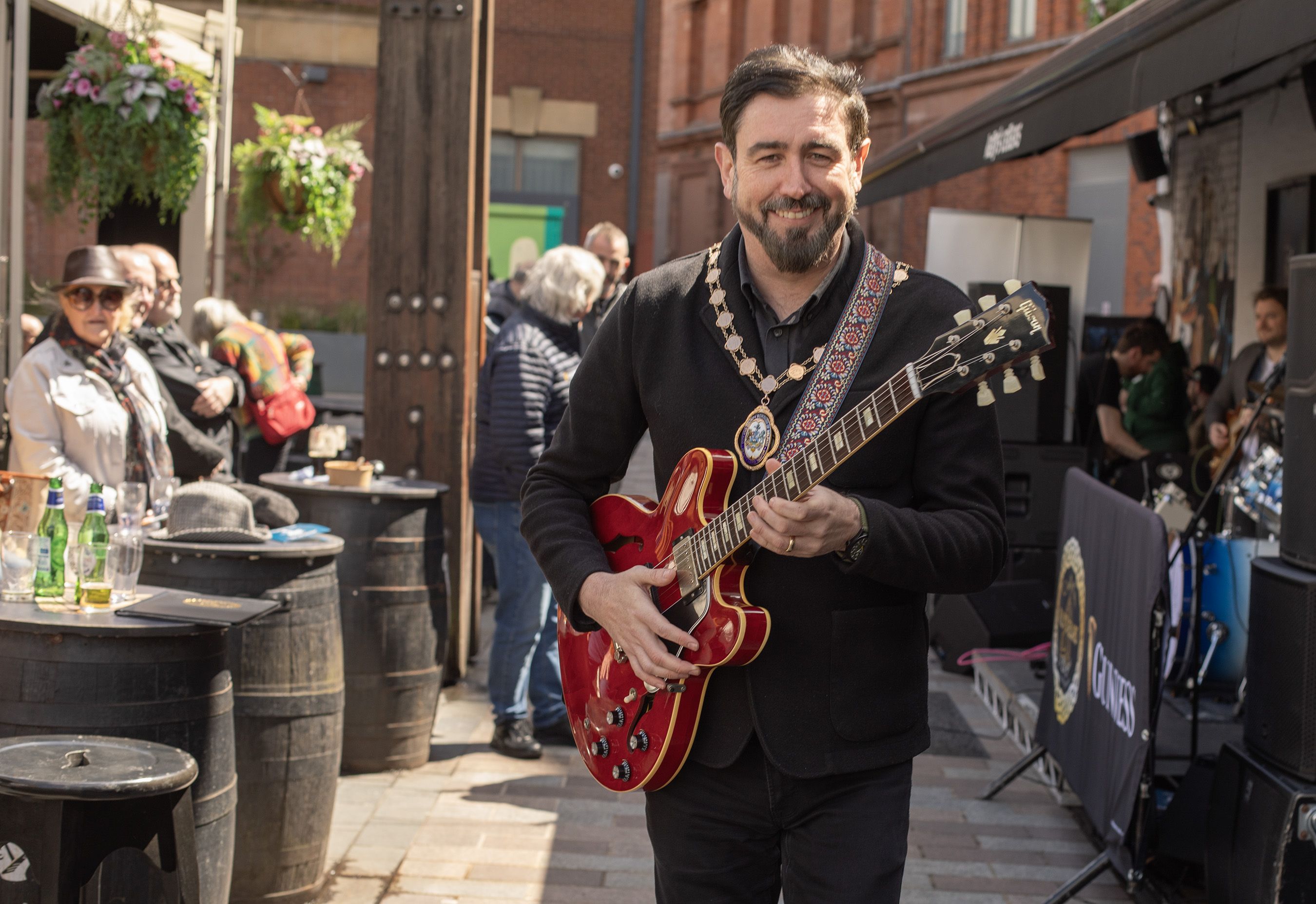 STRIKING A CHORD: Deputy Lord Mayor Paul Doherty couldn\'t resist the temptation during the festival launch at Kelly\'s Cellars
